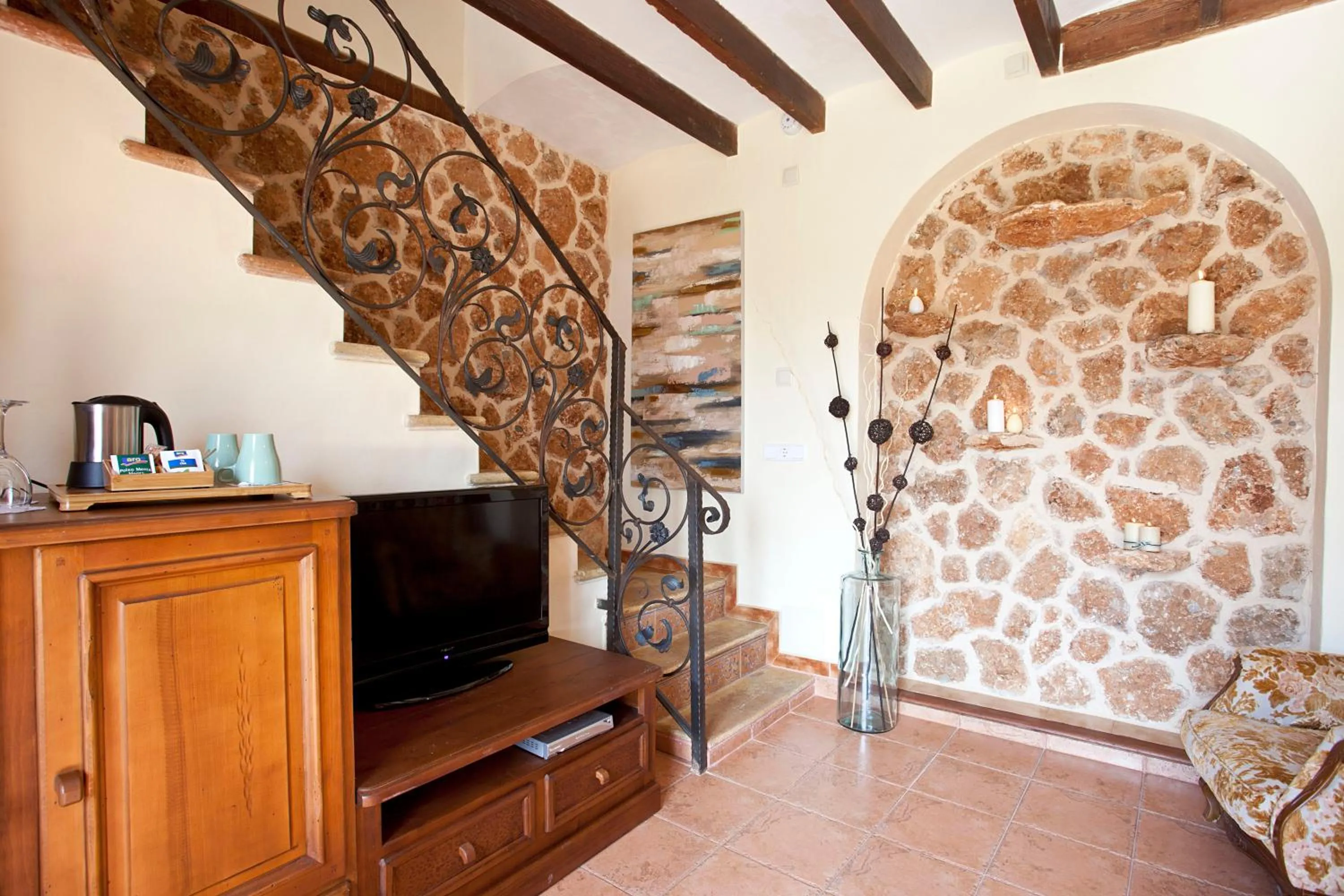 Communal lounge/ TV room in Agroturismo Es Quatre Cantons