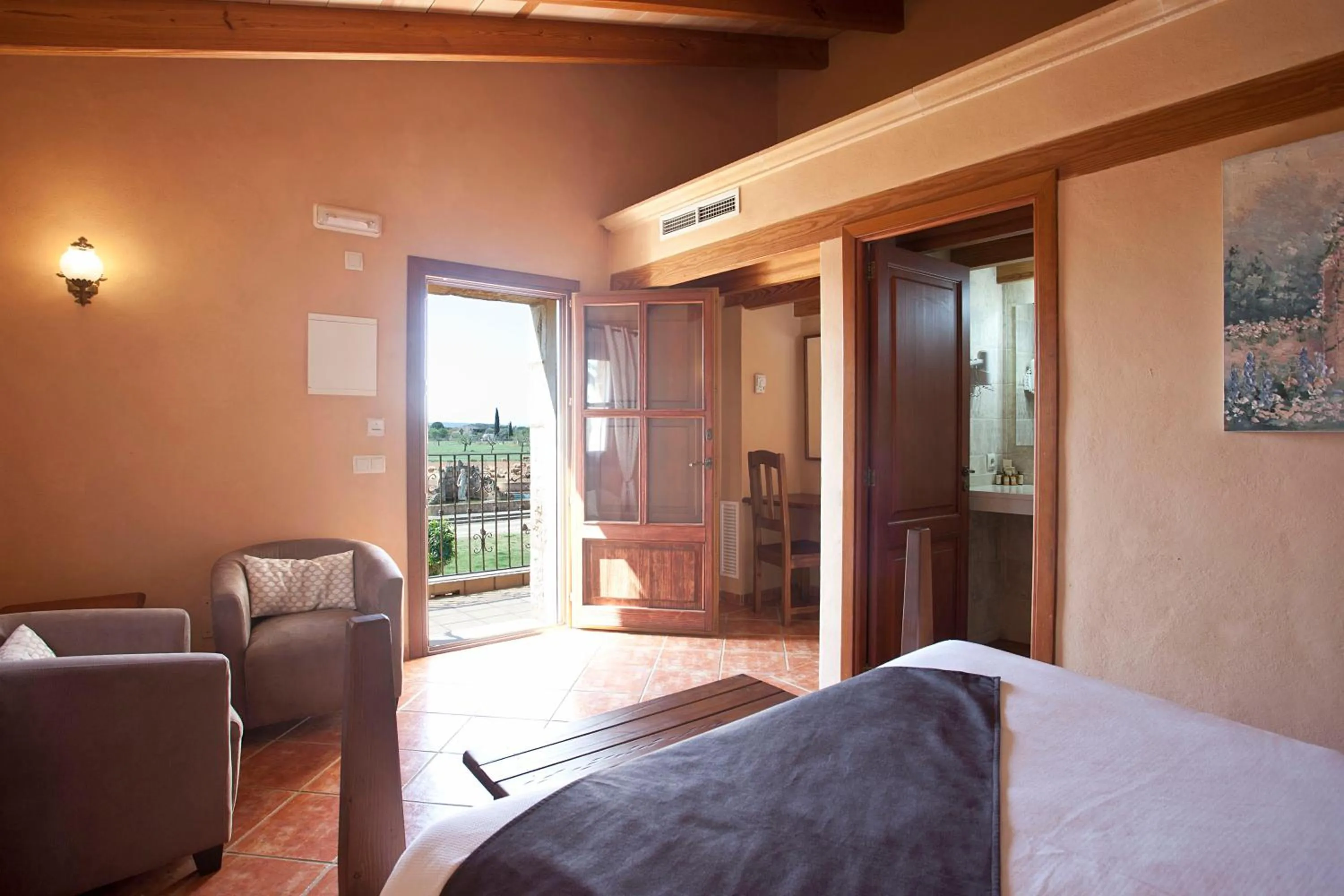 Seating area, Bed in Agroturismo Es Quatre Cantons