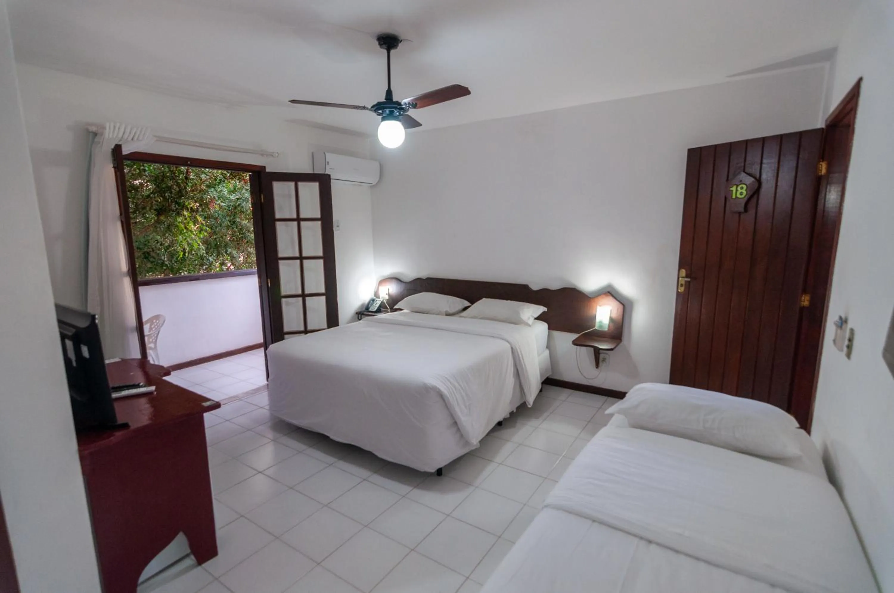 Bedroom in Buzios Arambaré Hotel