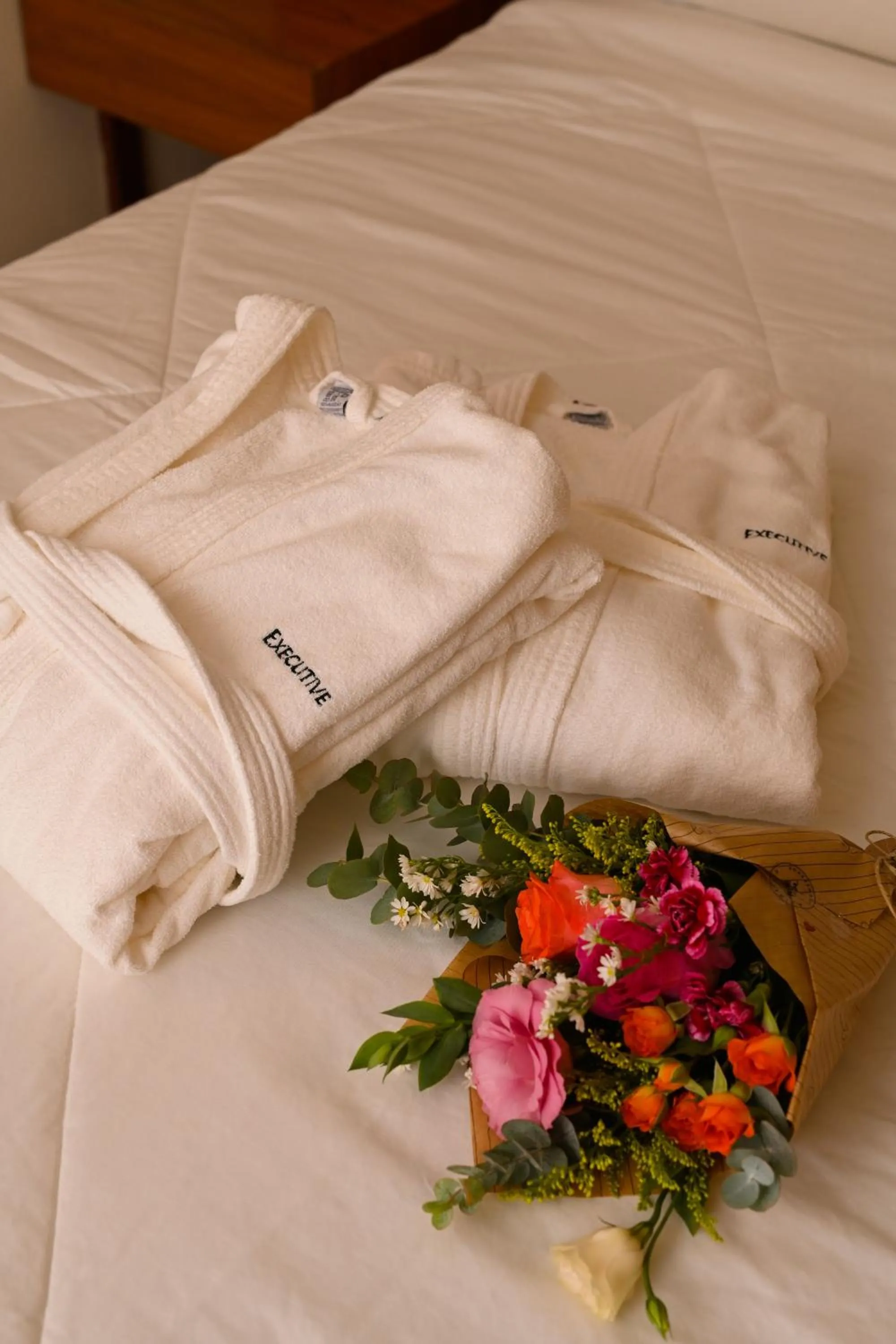 Bed in Executive Inn Hotel