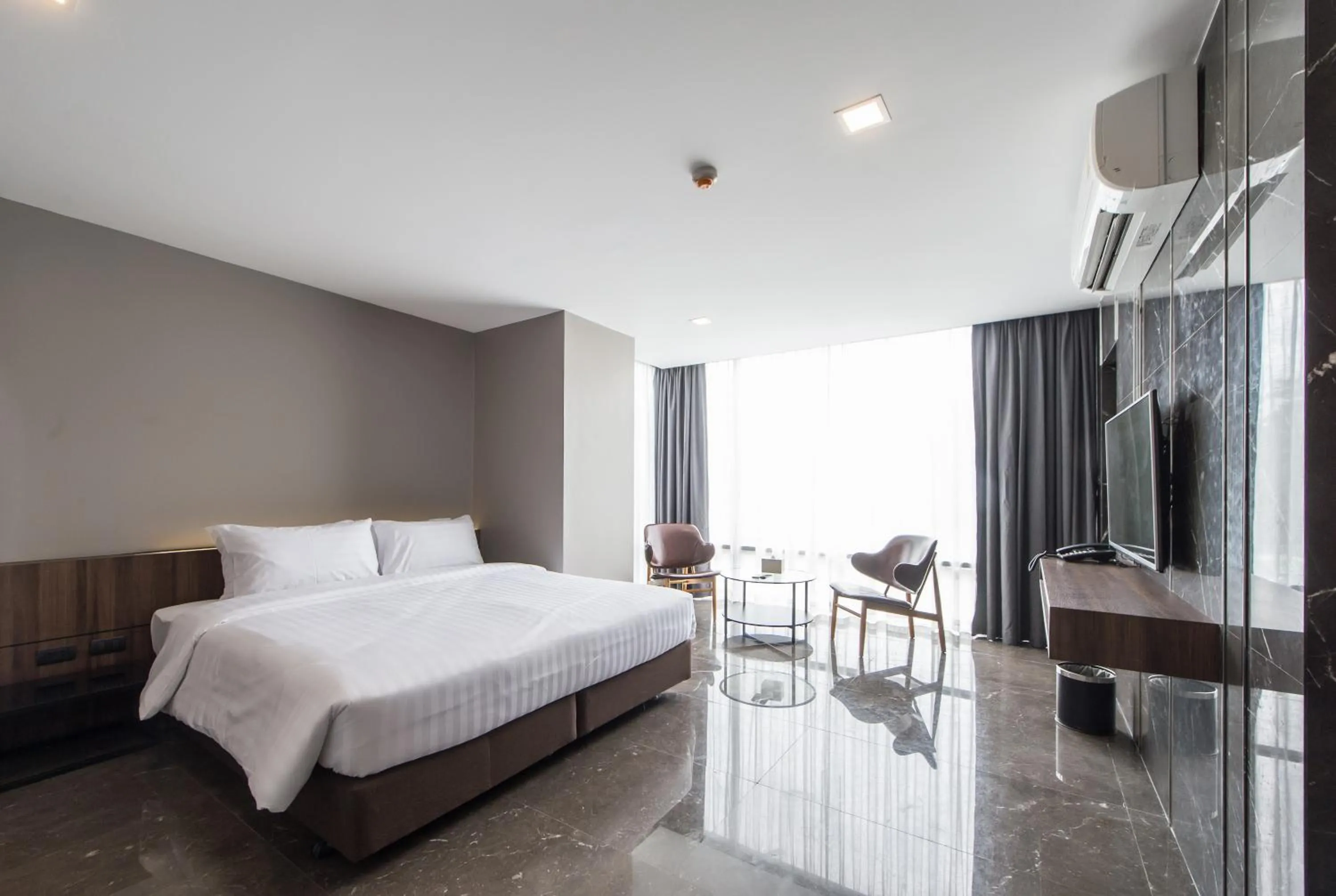 Bed in Onix Hotel Bangkok