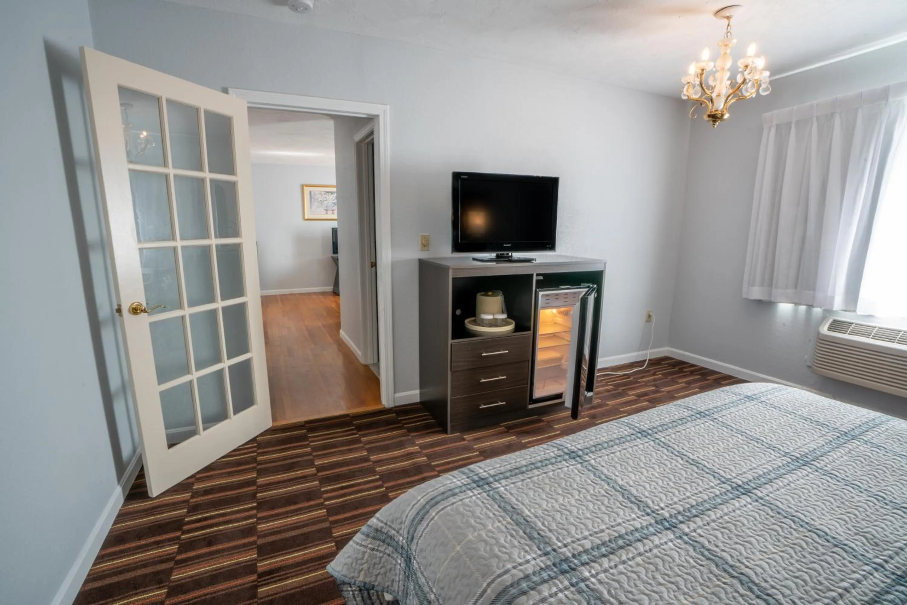 Bed in Hyannis Plaza Hotel