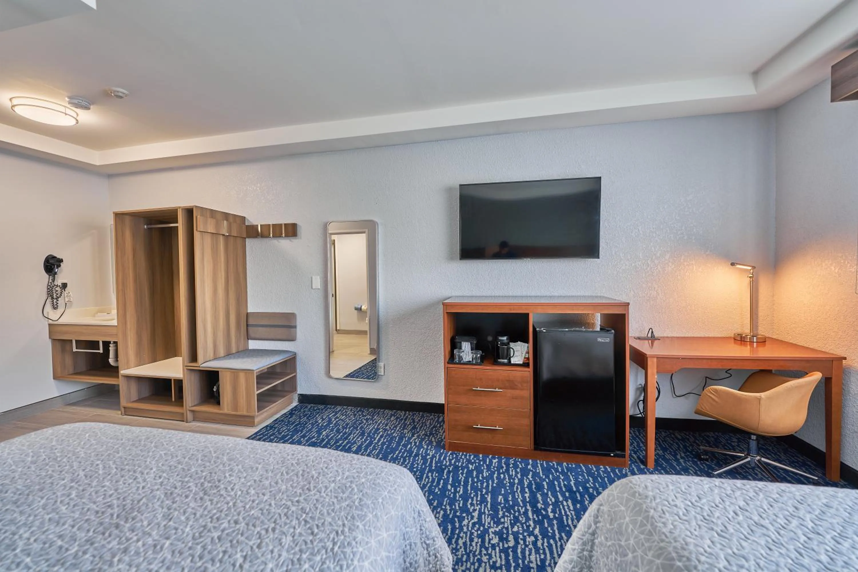 Bed in Hyannis Plaza Hotel