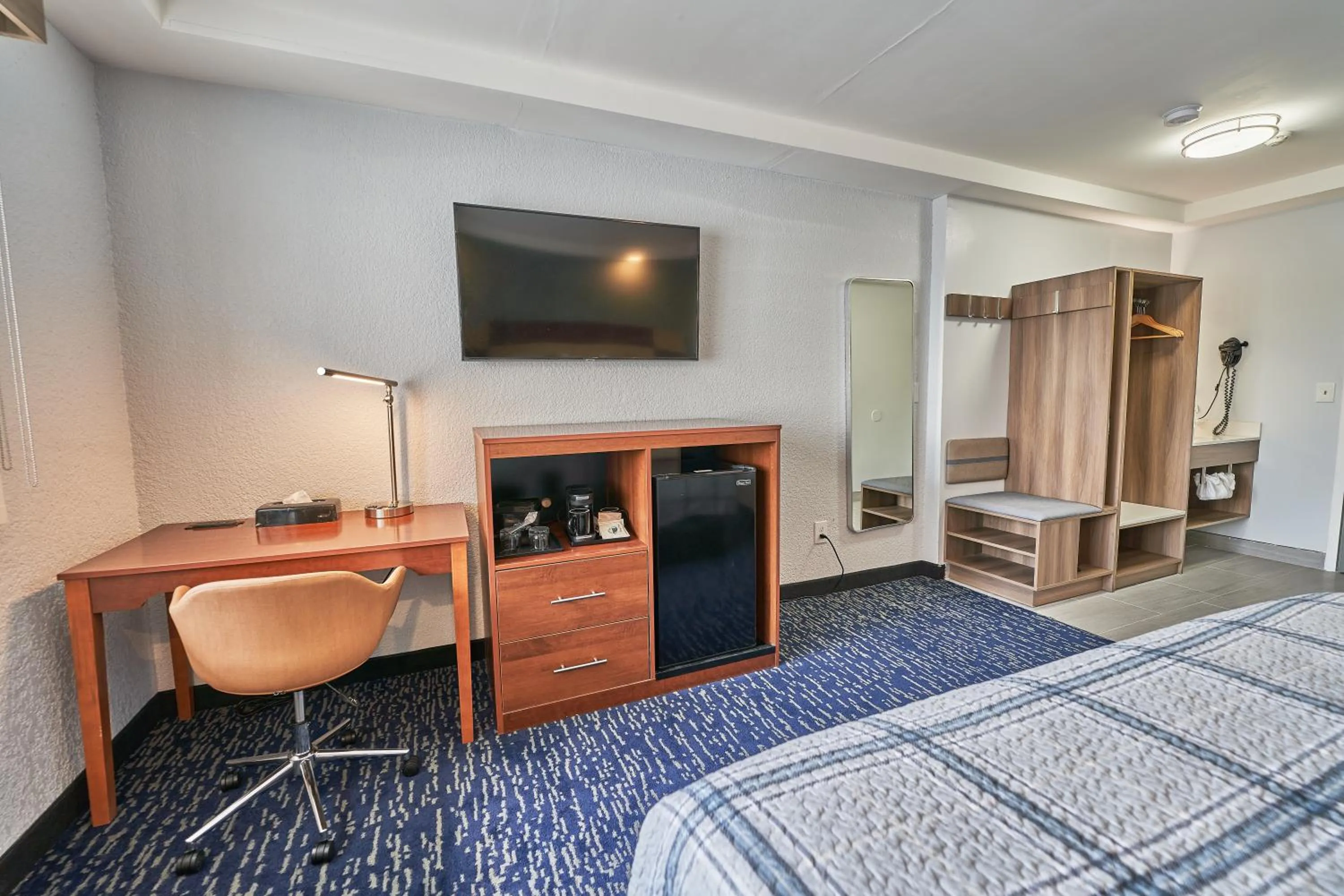 Bed in Hyannis Plaza Hotel