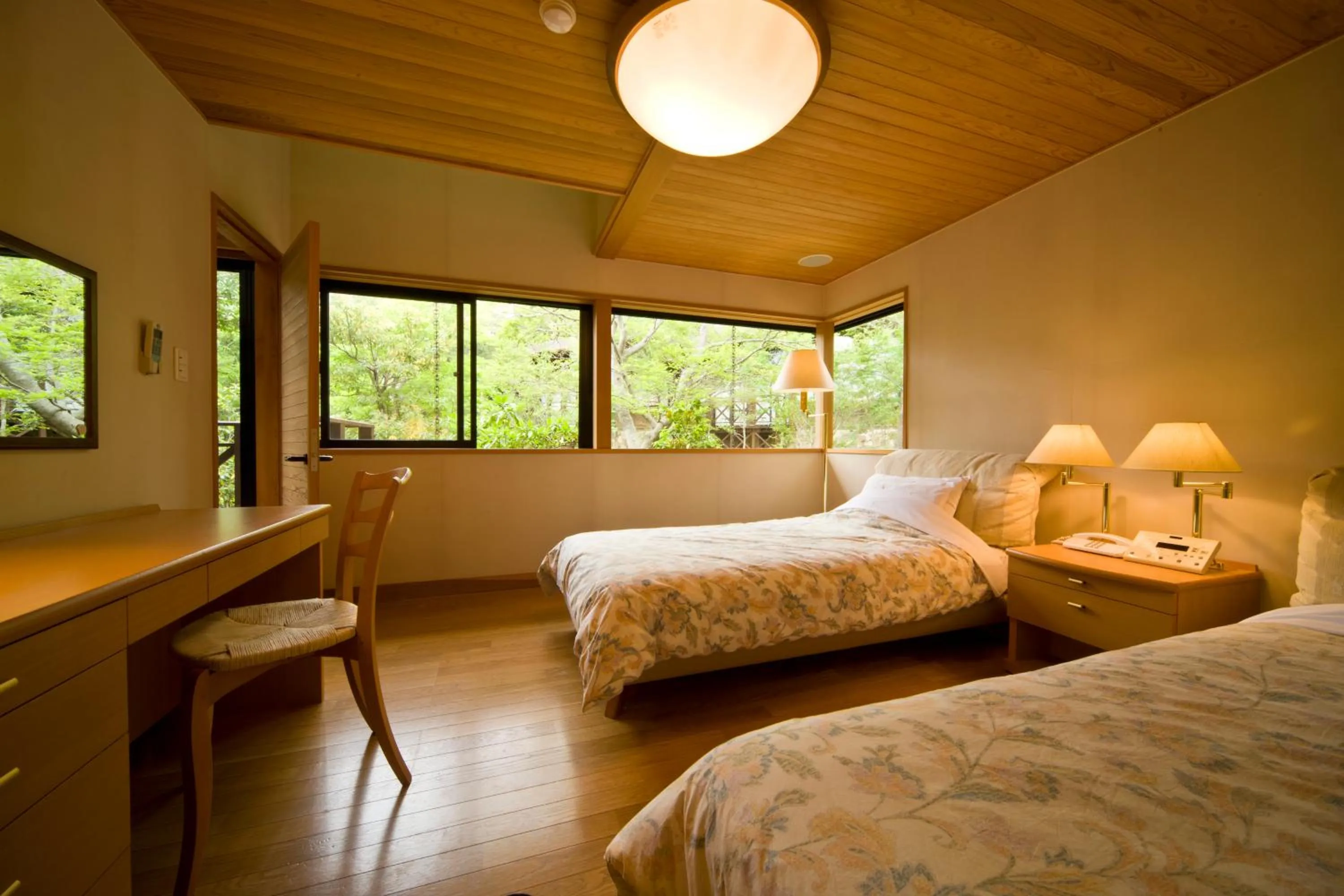 Bathroom, Bed in Miyako Resort Okushima Aqua Forest