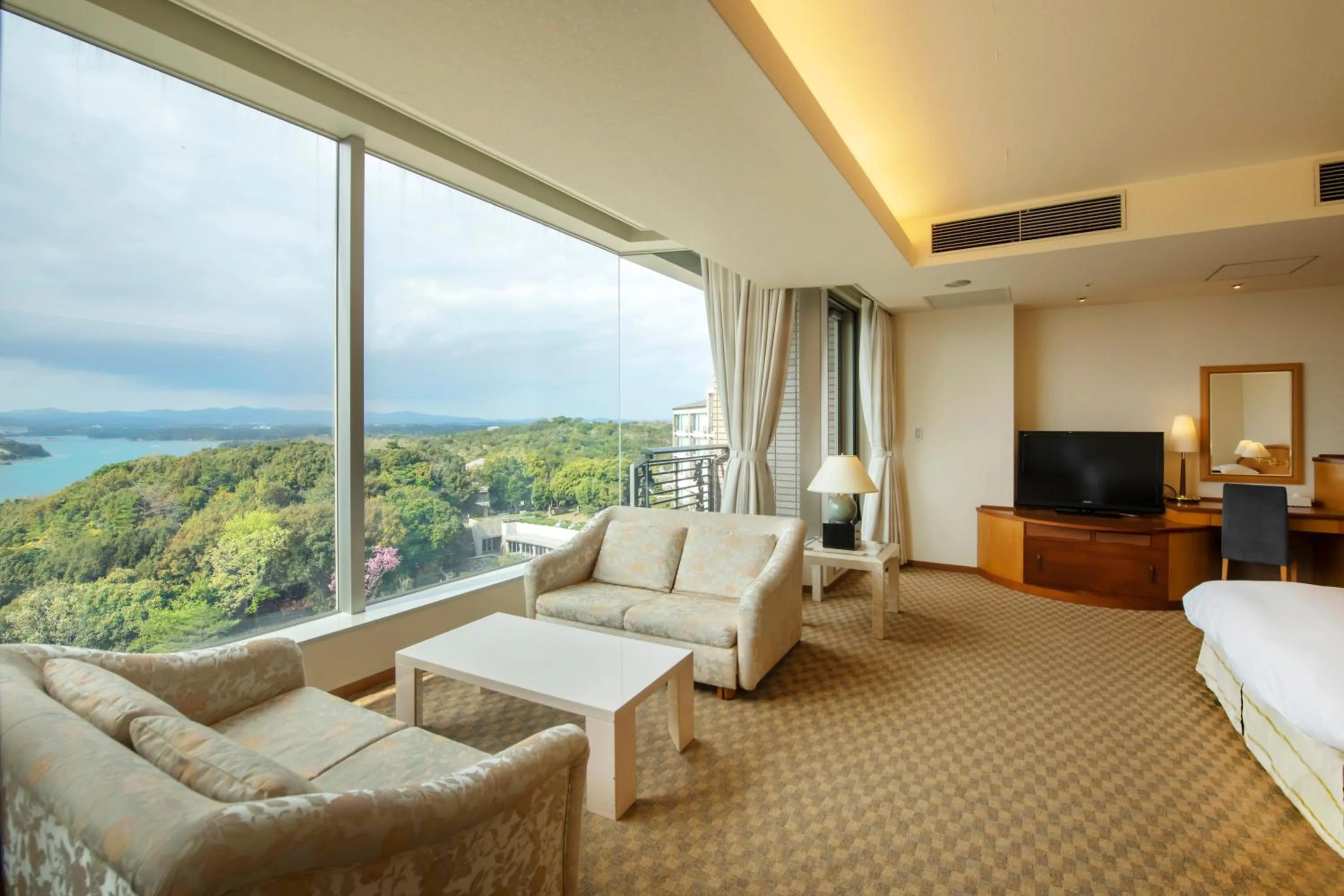 Bed in Miyako Resort Okushima Aqua Forest