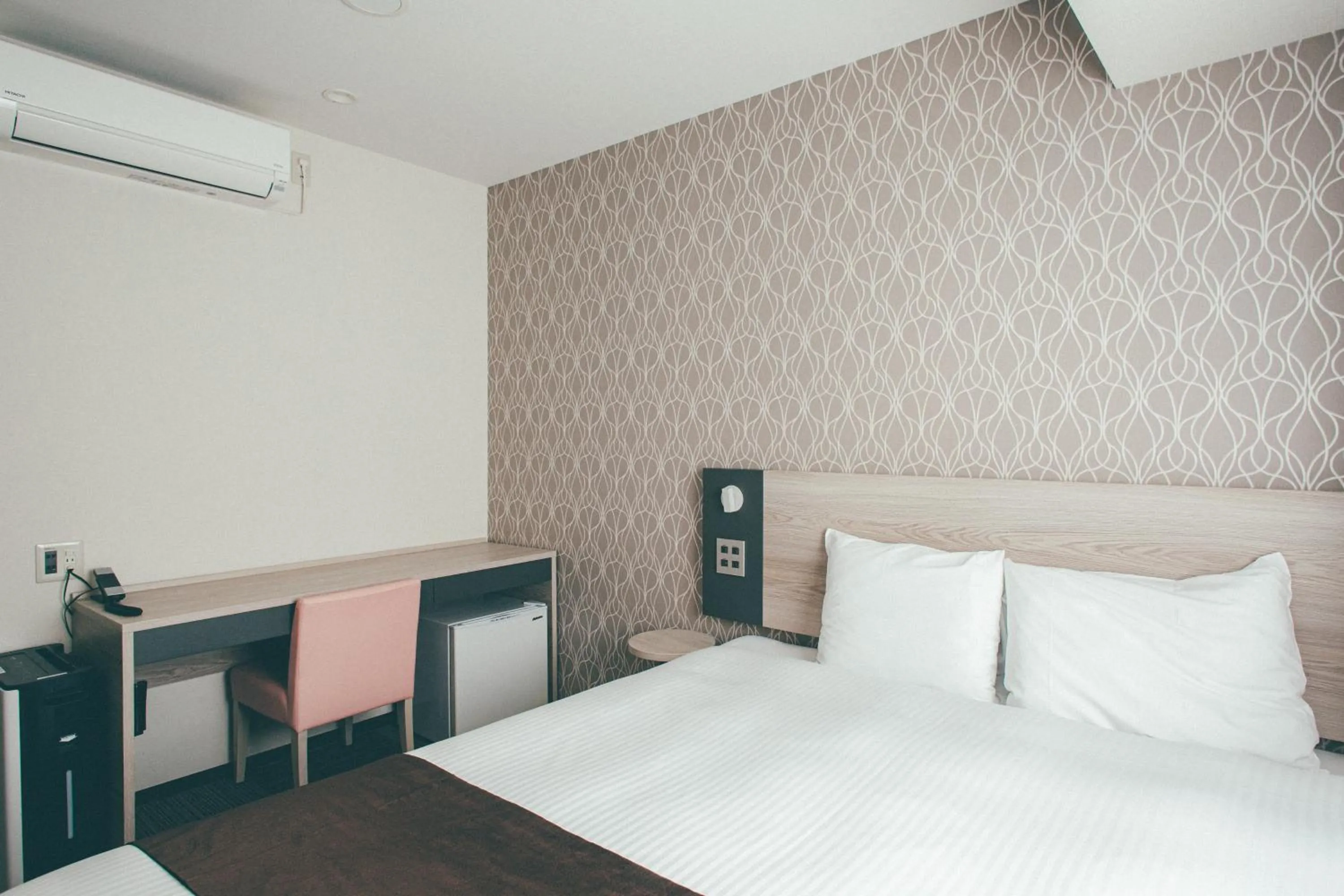 Bed in Kuretake Inn Premium Nagoya Nayabashi