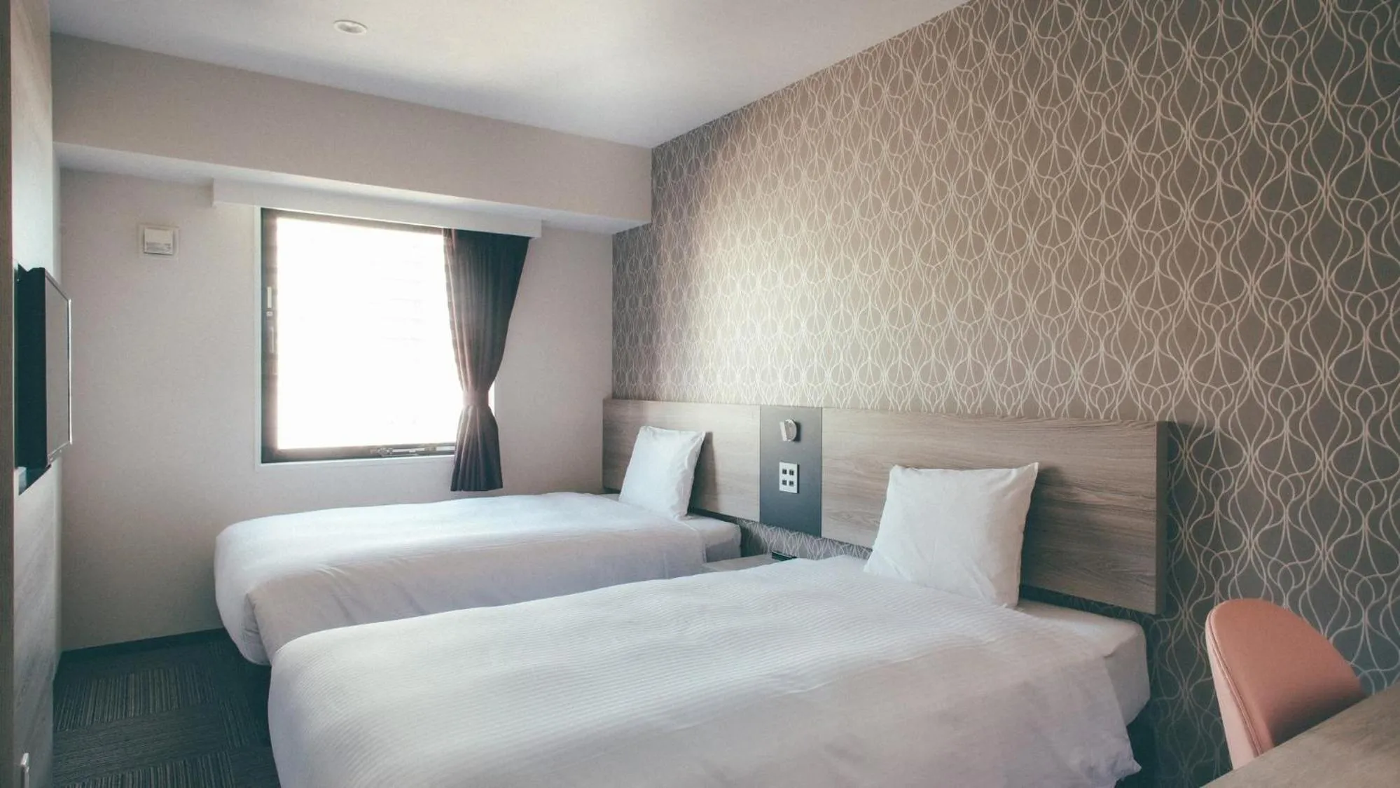 Bed in Kuretake Inn Premium Nagoya Nayabashi