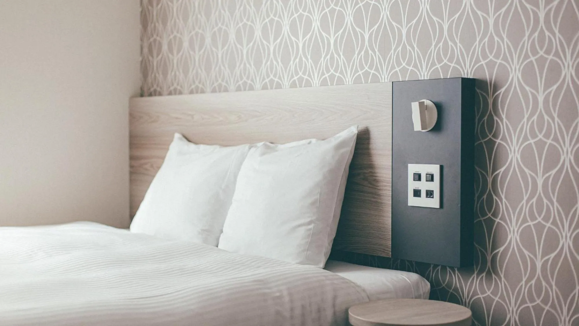 Bed in Kuretake Inn Premium Nagoya Nayabashi