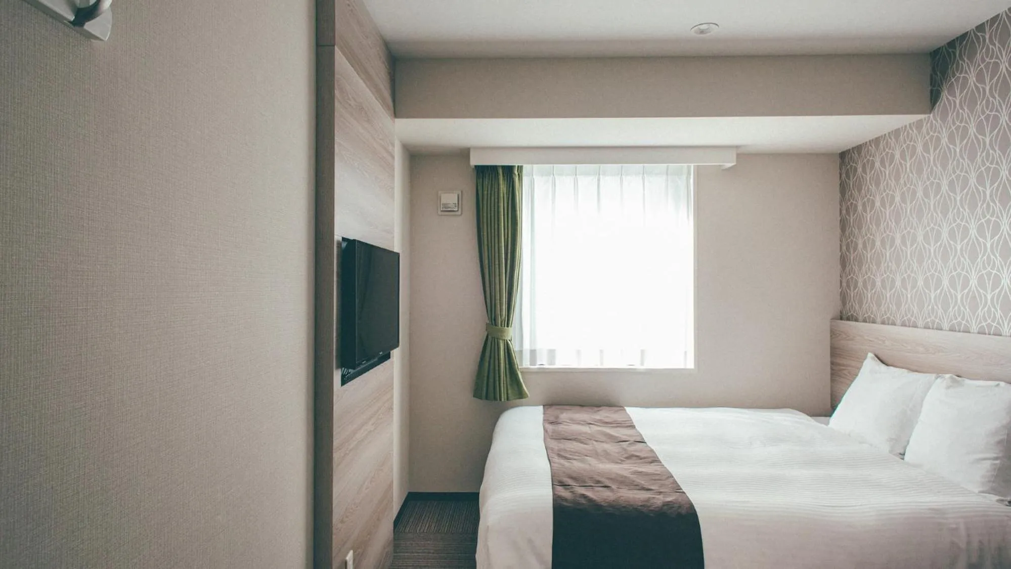 Bed in Kuretake Inn Premium Nagoya Nayabashi