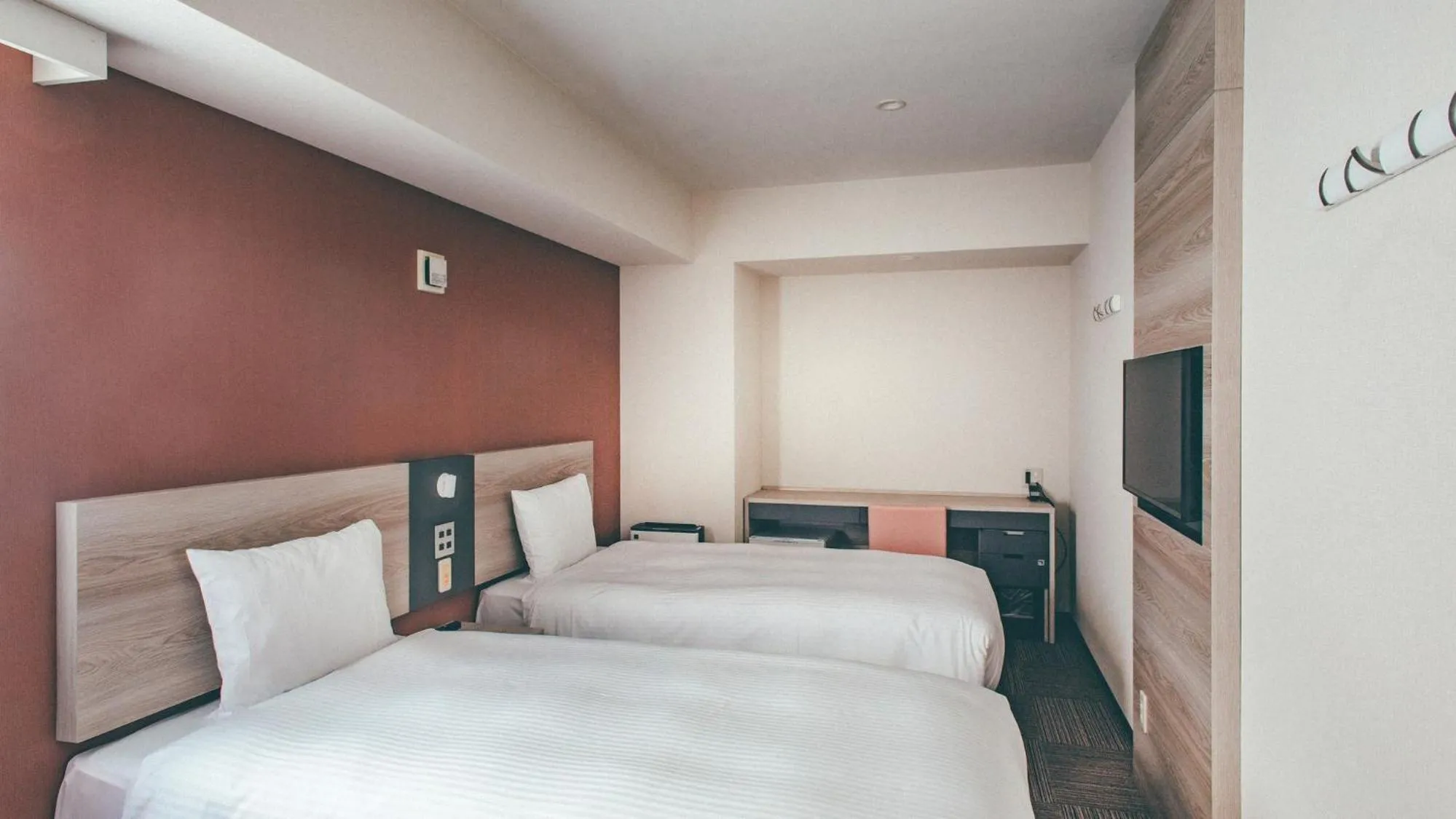 Bed in Kuretake Inn Premium Nagoya Nayabashi