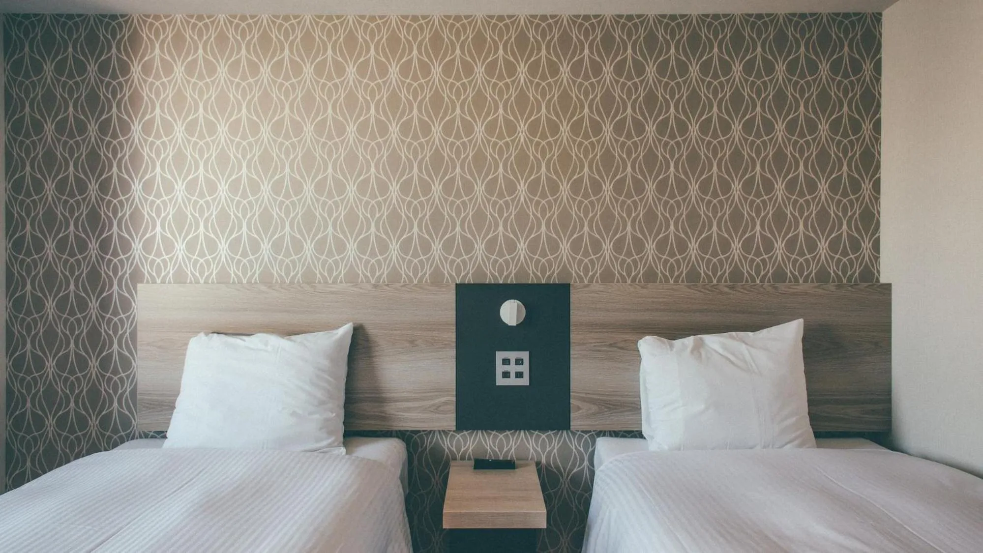 Bed in Kuretake Inn Premium Nagoya Nayabashi