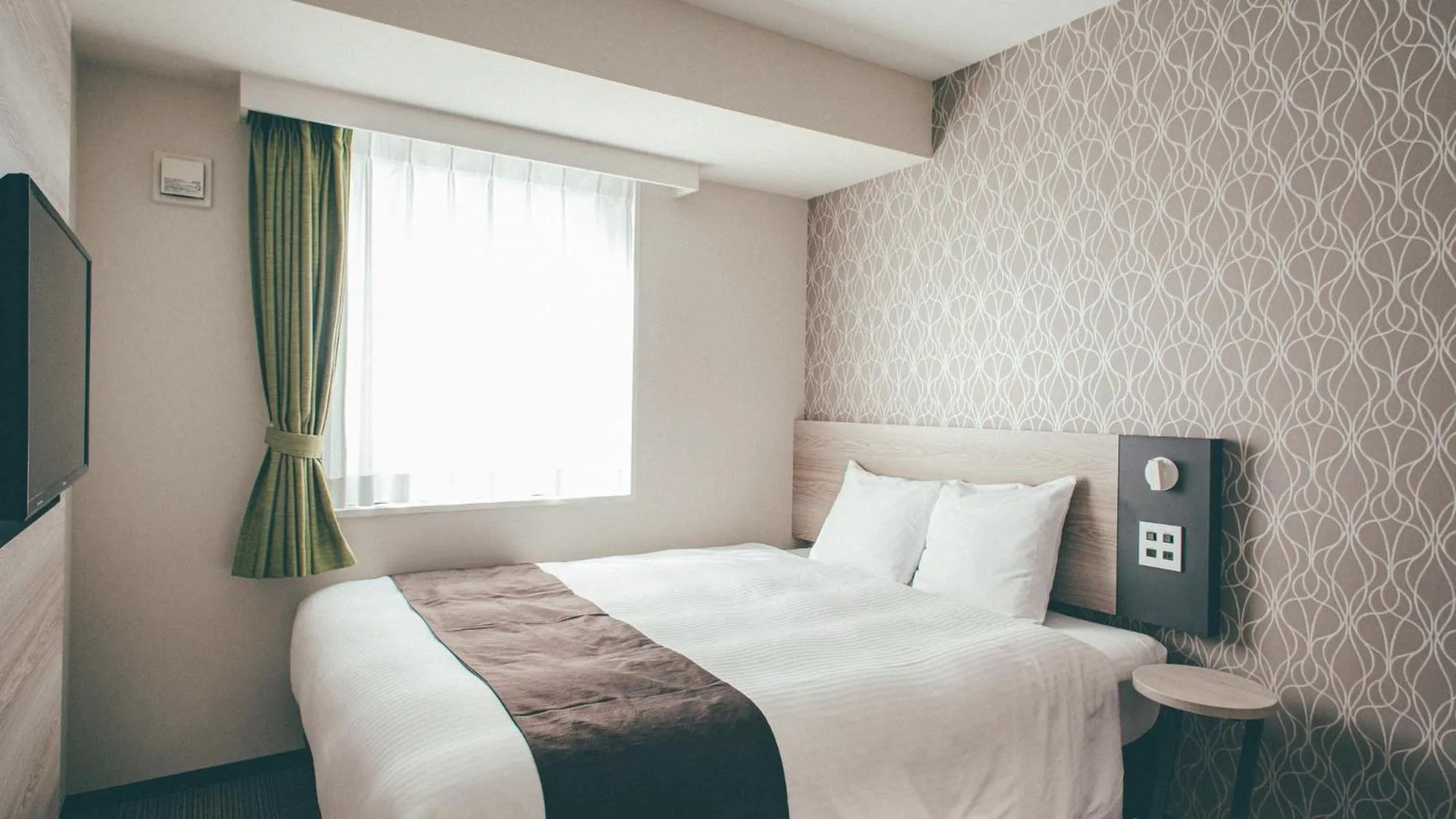 Bed in Kuretake Inn Premium Nagoya Nayabashi