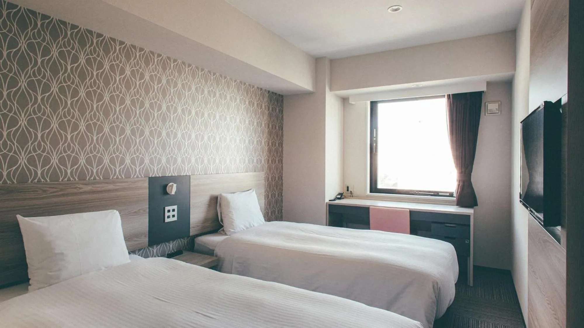 Bed in Kuretake Inn Premium Nagoya Nayabashi