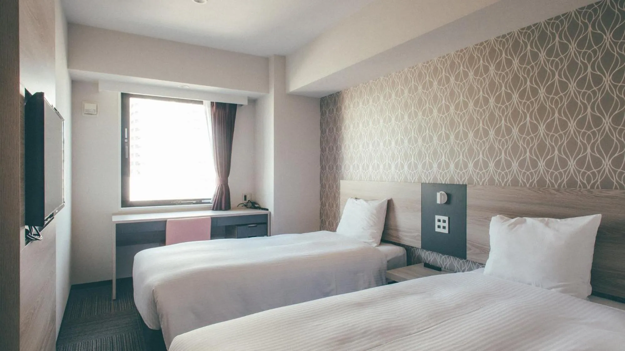 Bed in Kuretake Inn Premium Nagoya Nayabashi