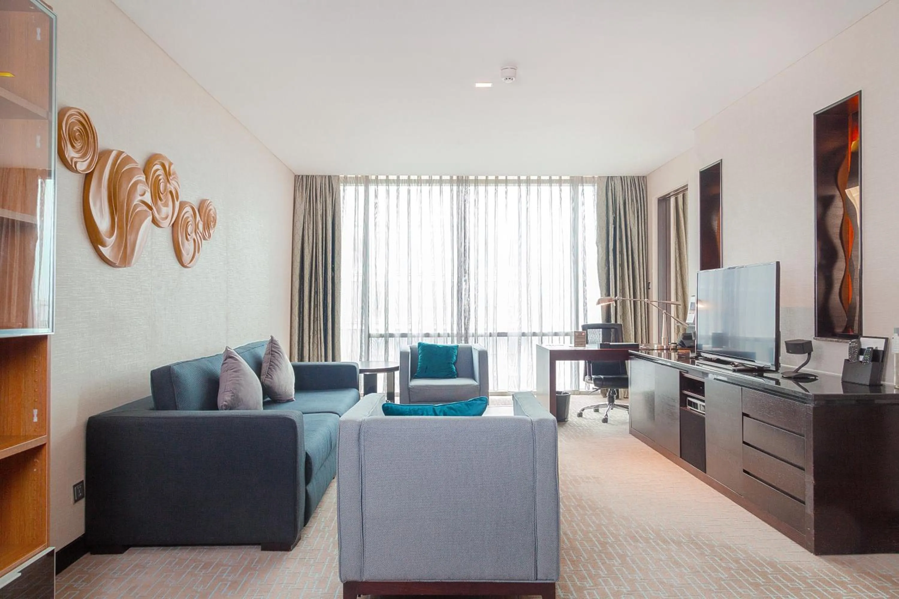 Living room in InterContinental Qingdao by IHG