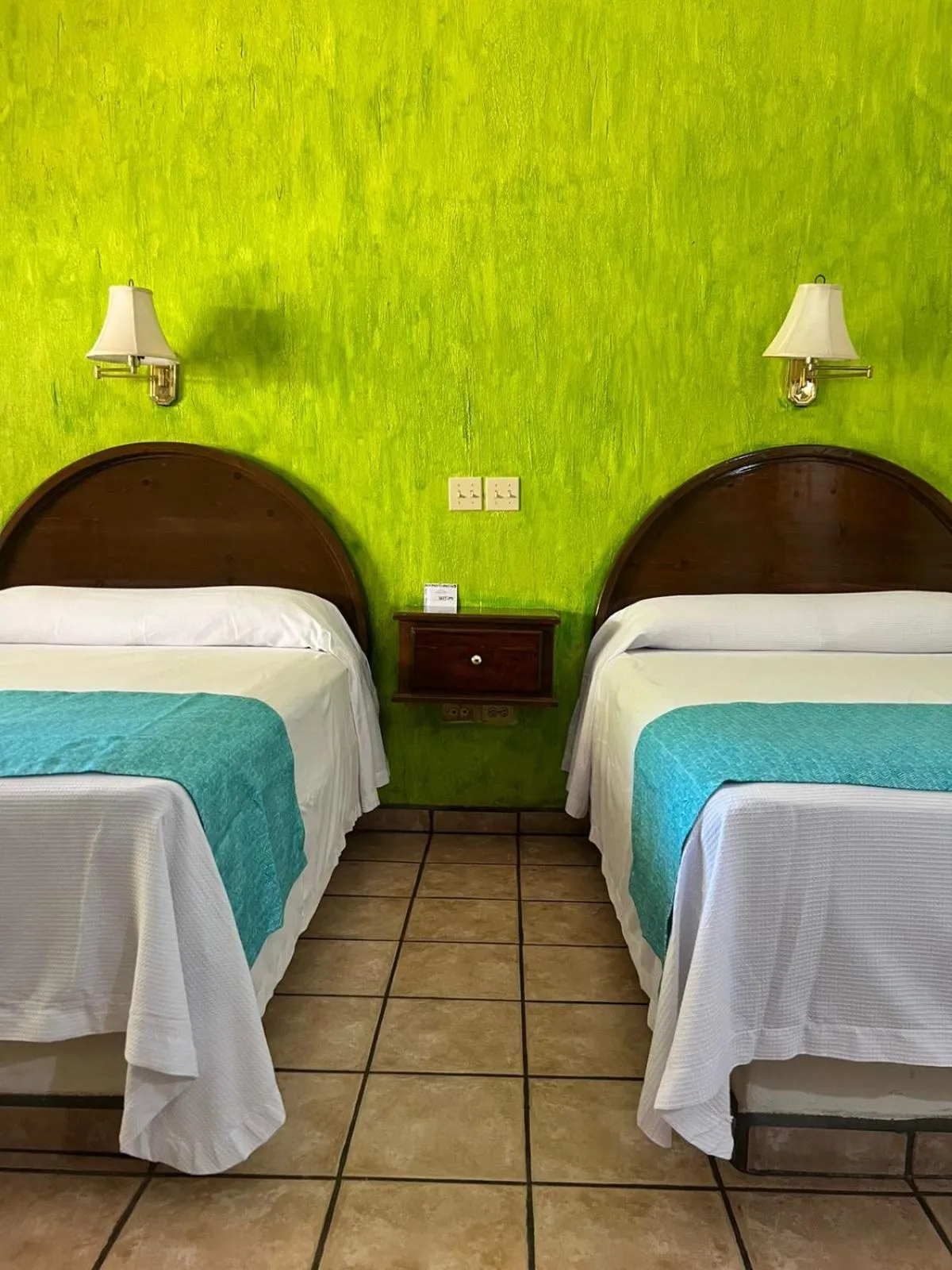 Bed in Hacienda Suites Loreto