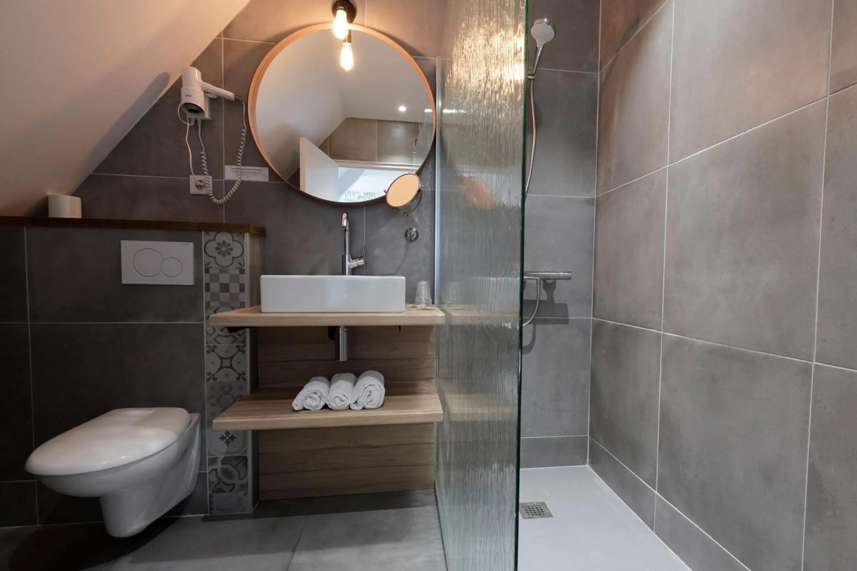 Bathroom in Logis Hotel Le Relais du Teulet