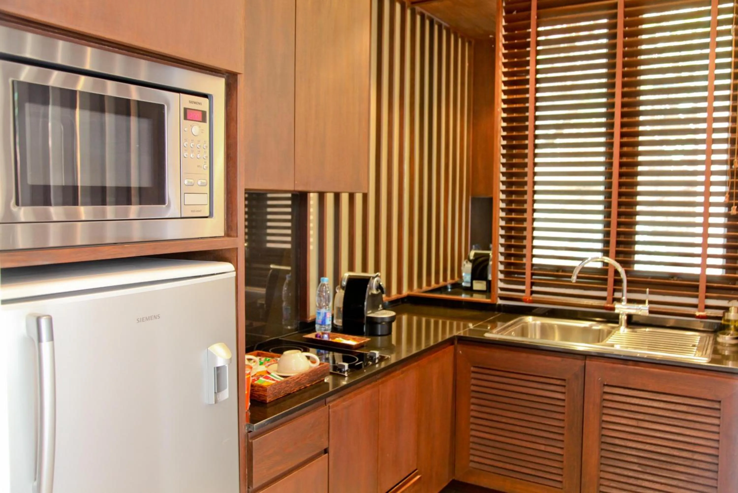 Kitchen or kitchenette in Sri Panwa Phuket Luxury Pool Villa Hotel - SHA Plus