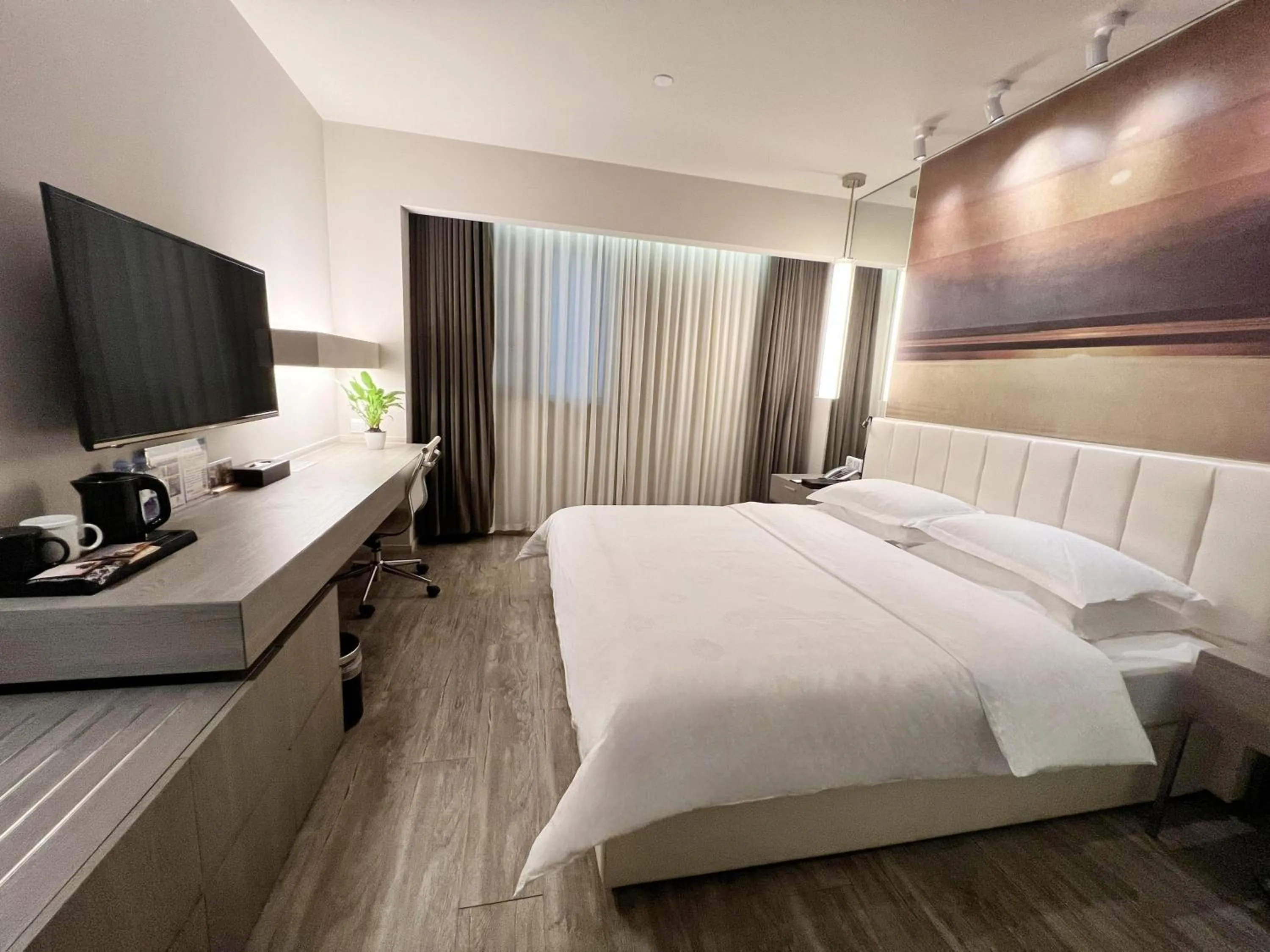 Bed in Jinjiang Metropolo Hotel Hangzhou East Railway Station