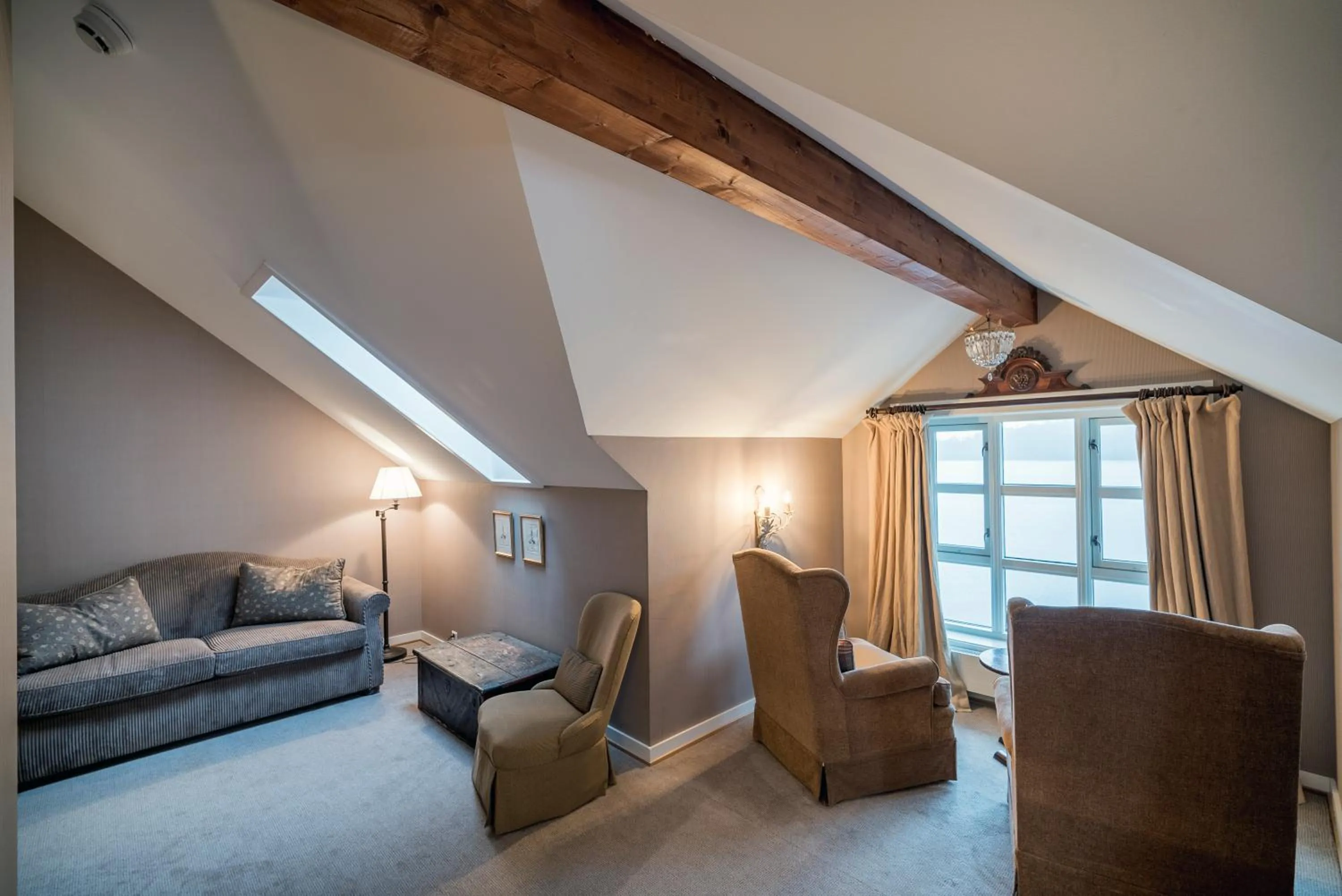 Seating area in Angvik Gamle Handelssted - by Classic Norway Hotels