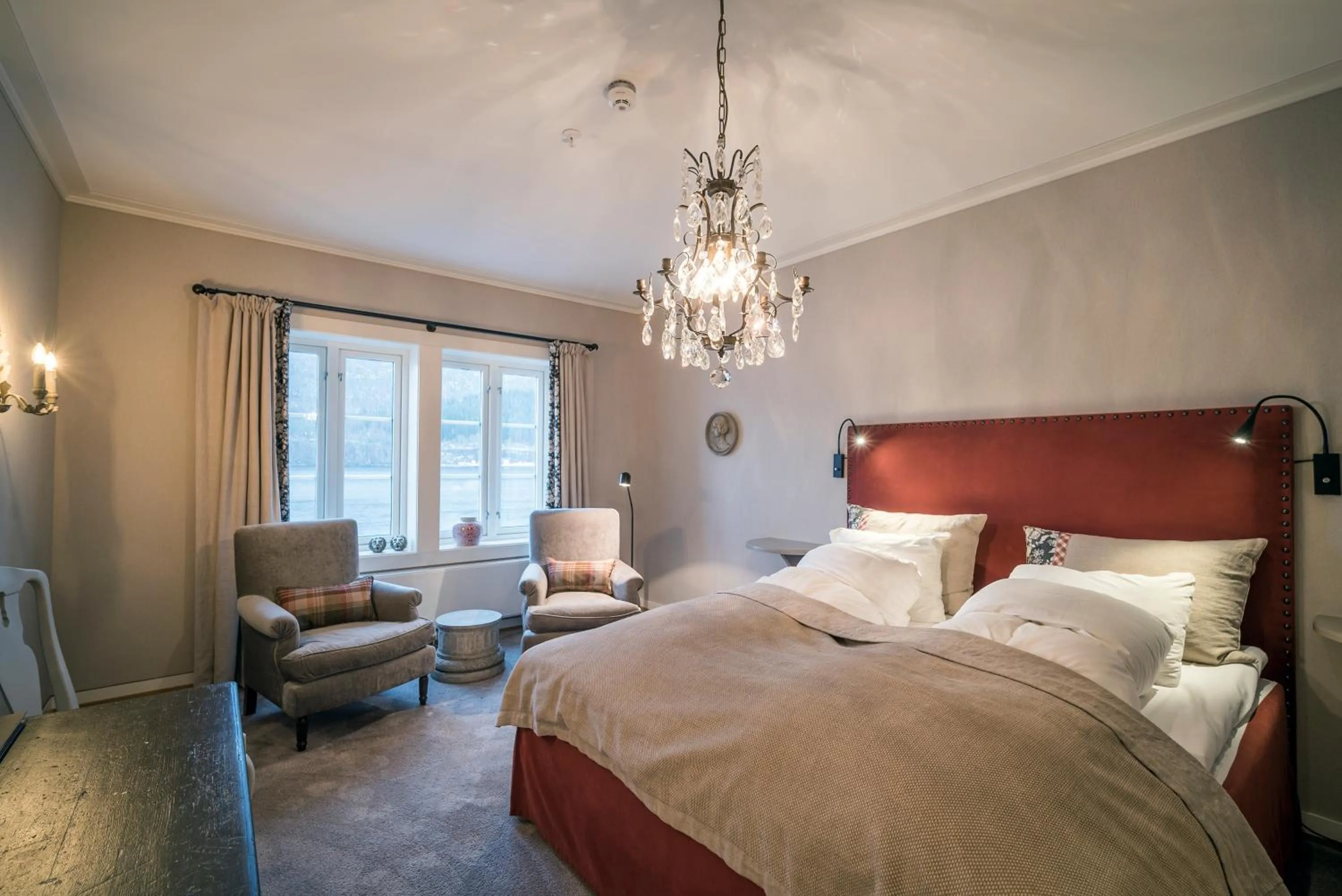 Photo of the whole room, Bed in Angvik Gamle Handelssted - by Classic Norway Hotels