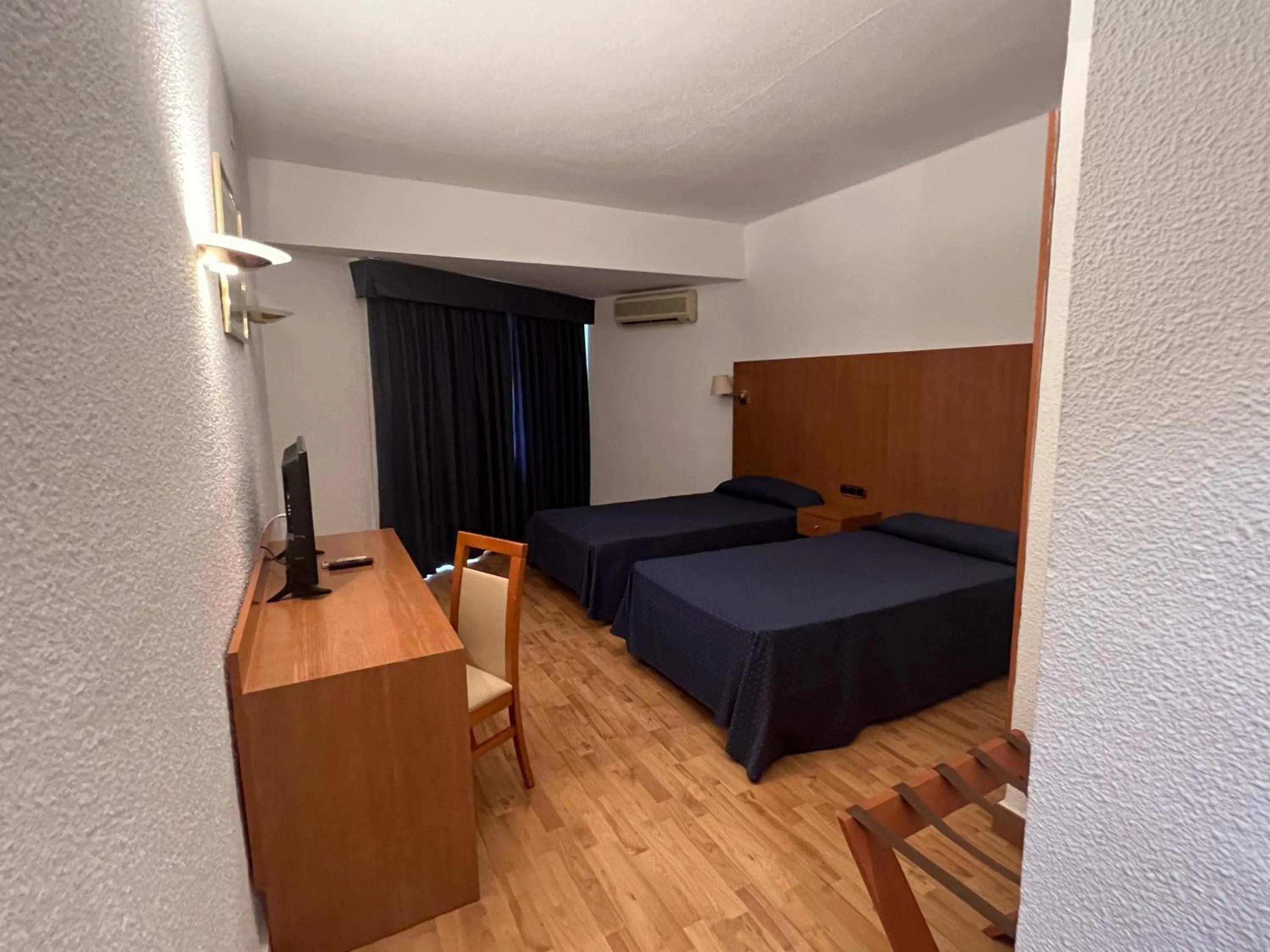 Bed in Hotel El Cisne