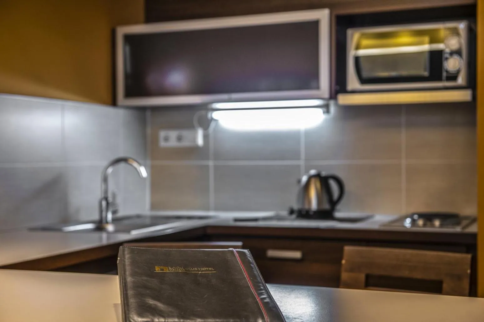 Kitchen or kitchenette in Royal Club Hotel