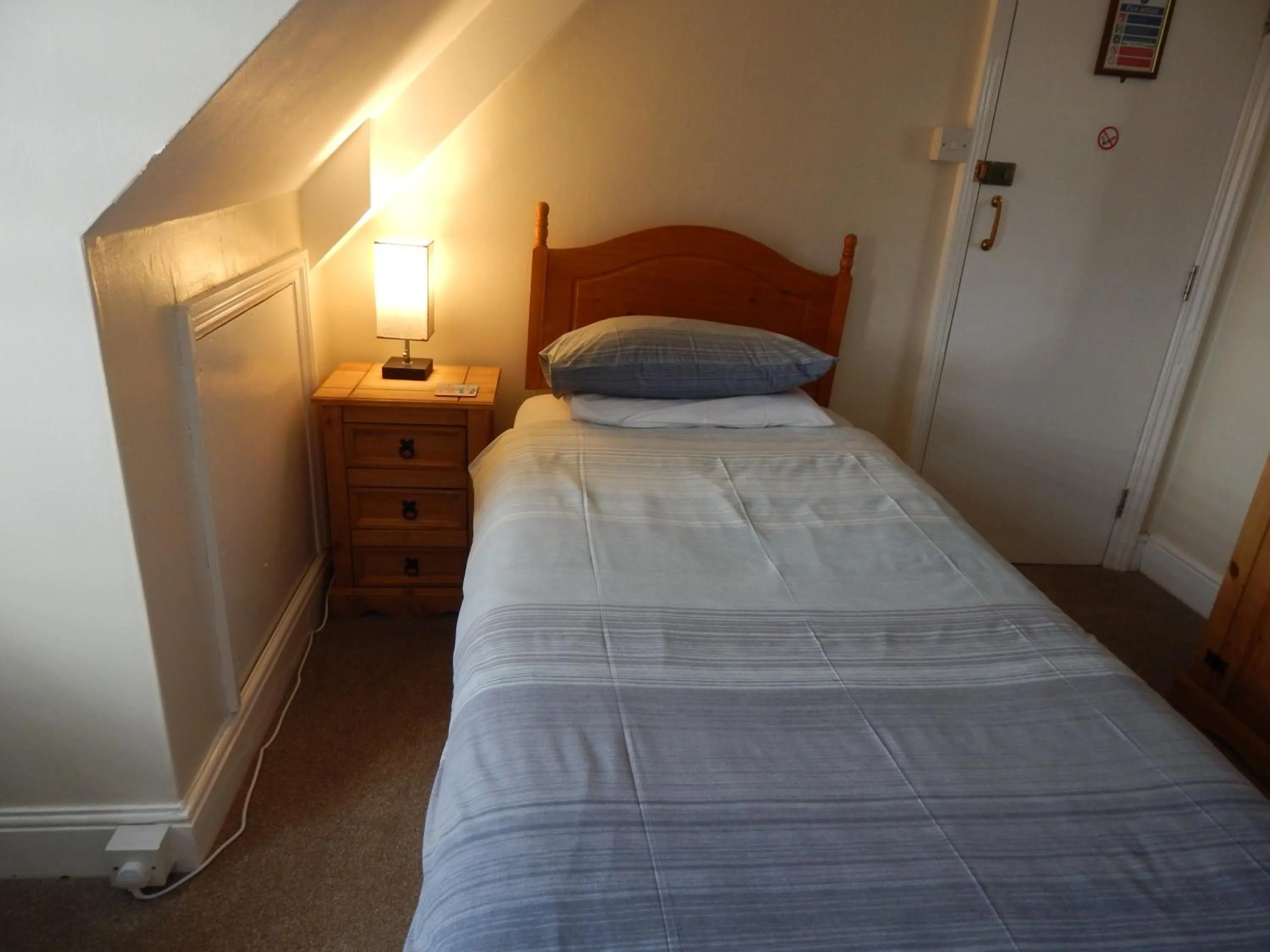 Bed in The Garfield Guest House