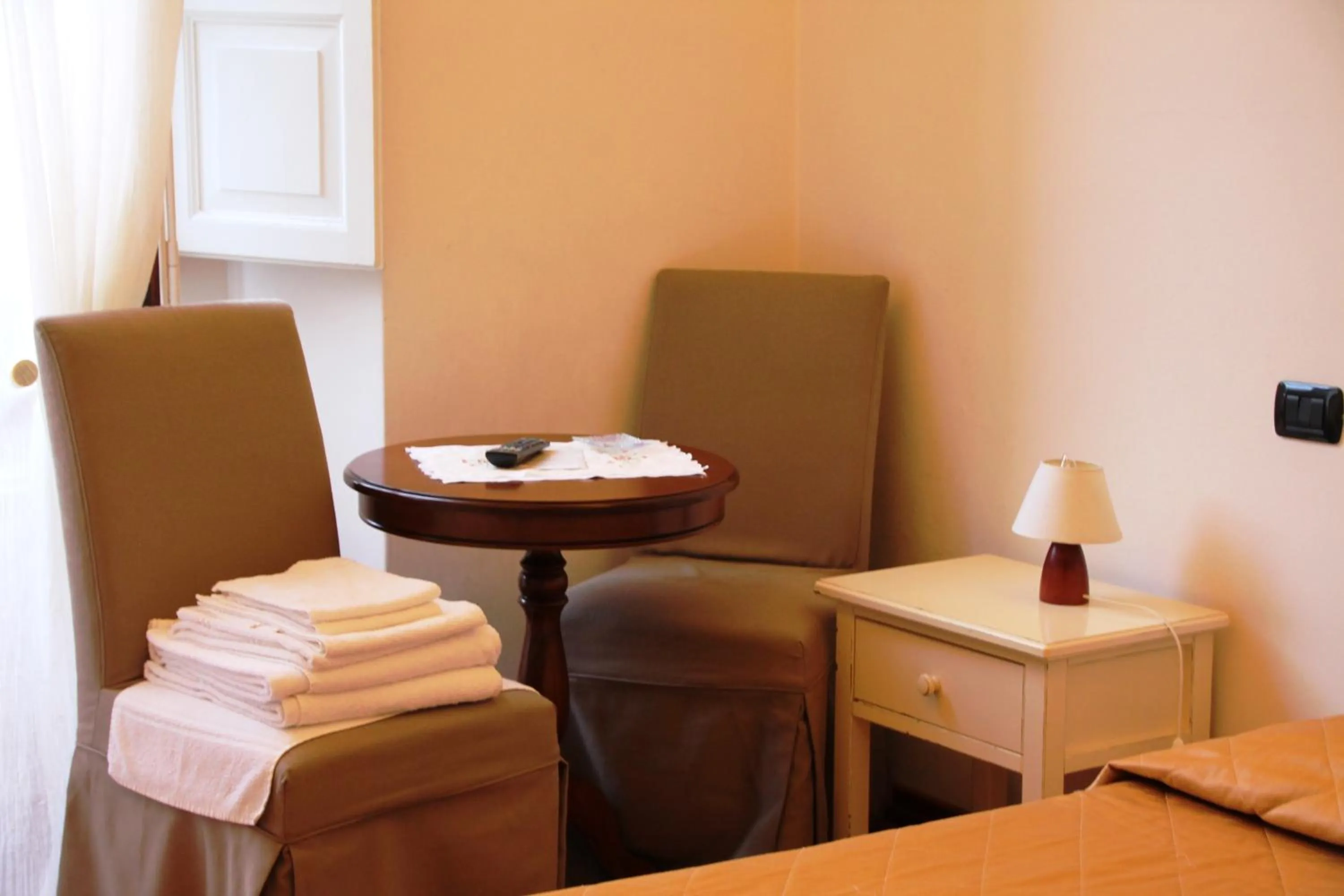 Seating area, Bed in B&B Magnifico Messere