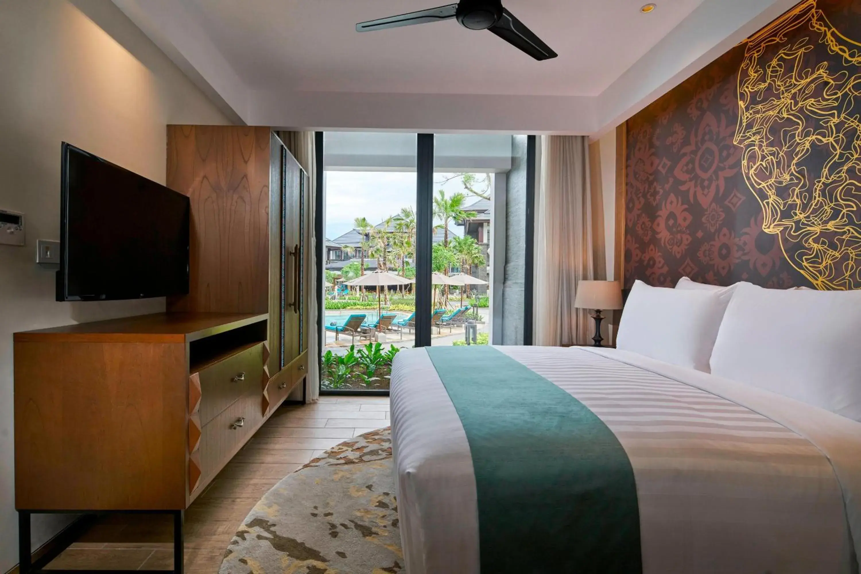 One Bedroom apartment with king bed, a sofa and balcony in Marriott’s Bali Nusa Dua Gardens One Bedroom apartment with king bed, a sofa and balcony in Marriott’s Bali Nusa Dua Gardens