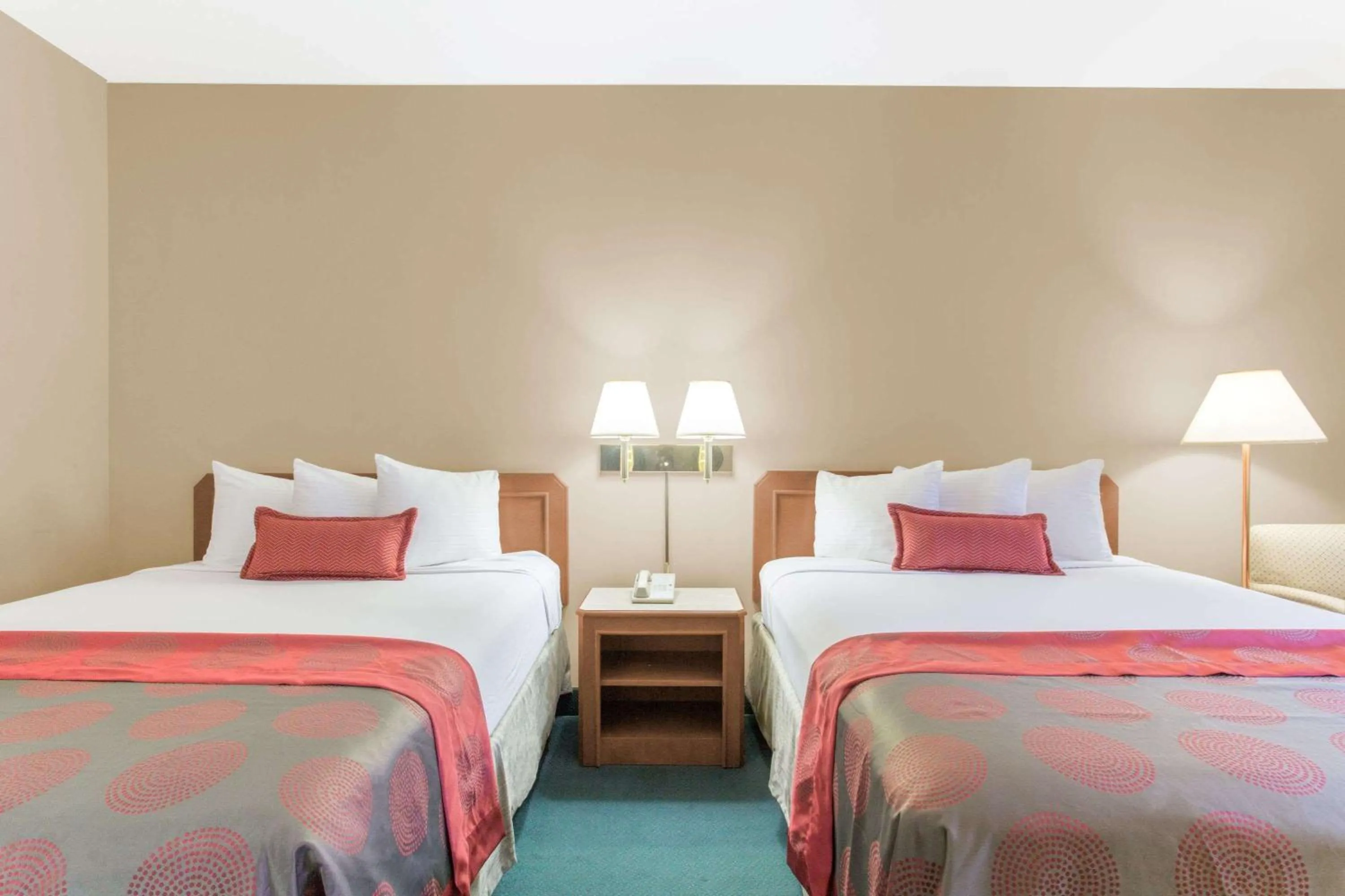 Photo of the whole room, Bed in Ramada by Wyndham St George