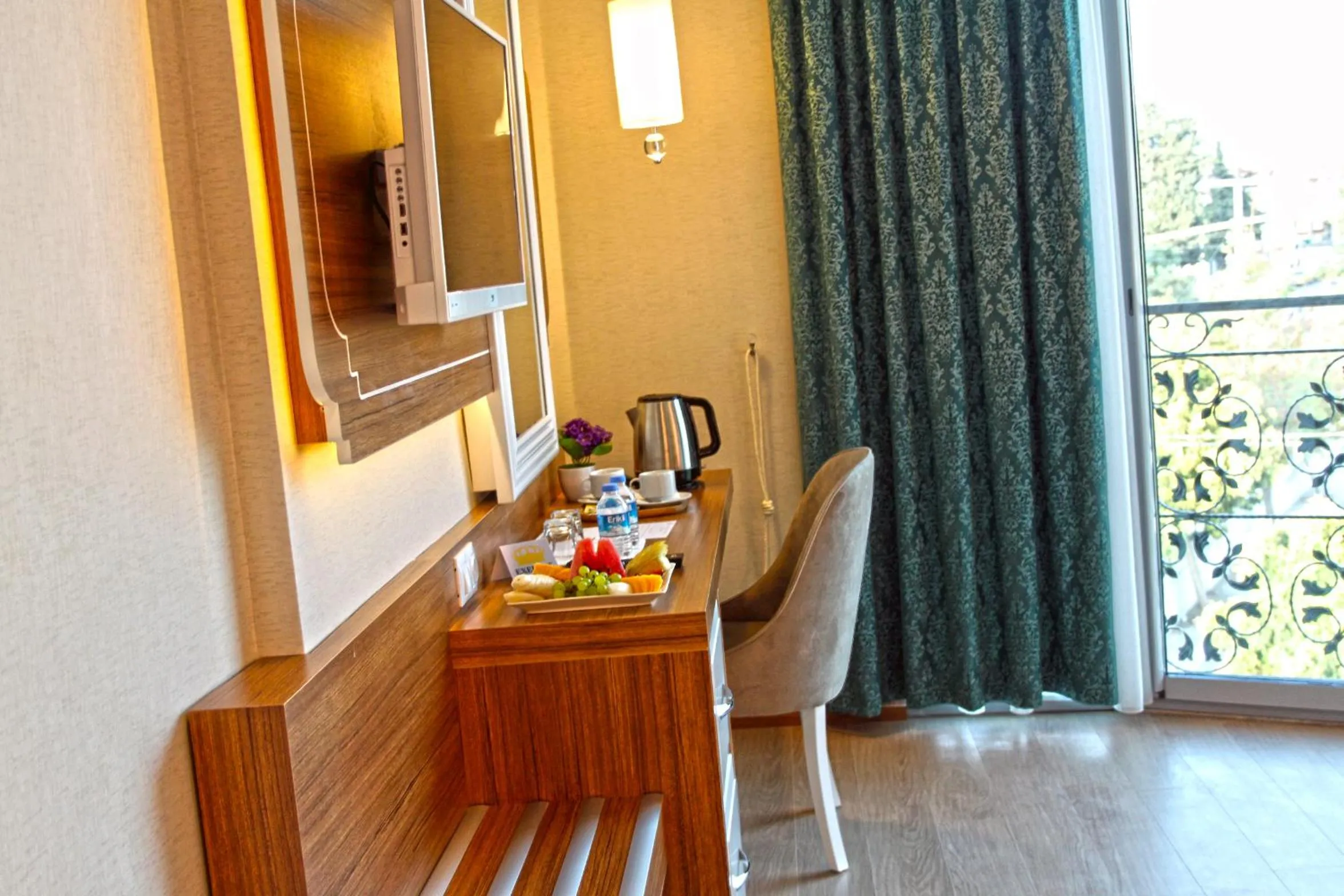 Bed in Exelans Hotel