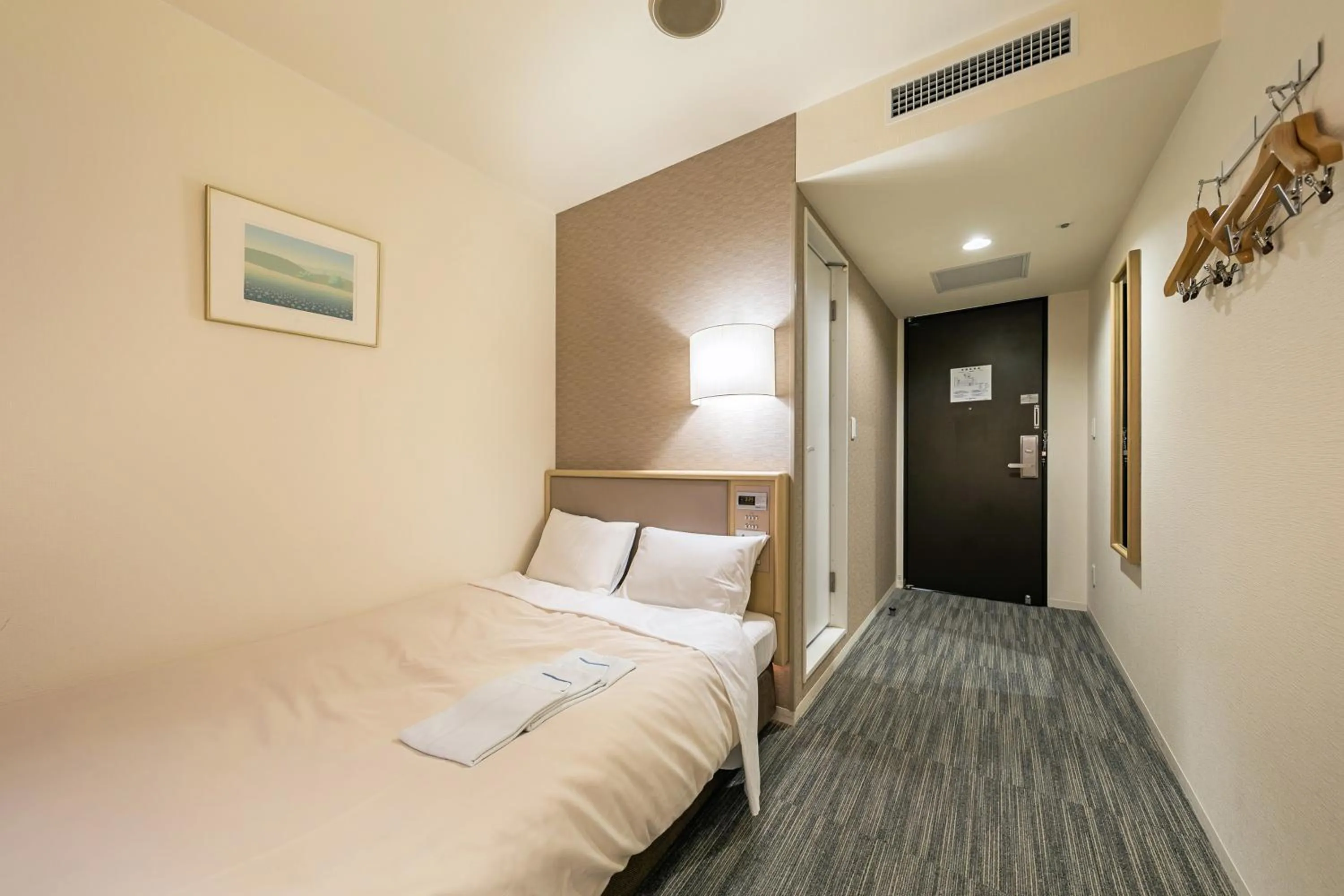 Bed in Ginza Capital Hotel Akane