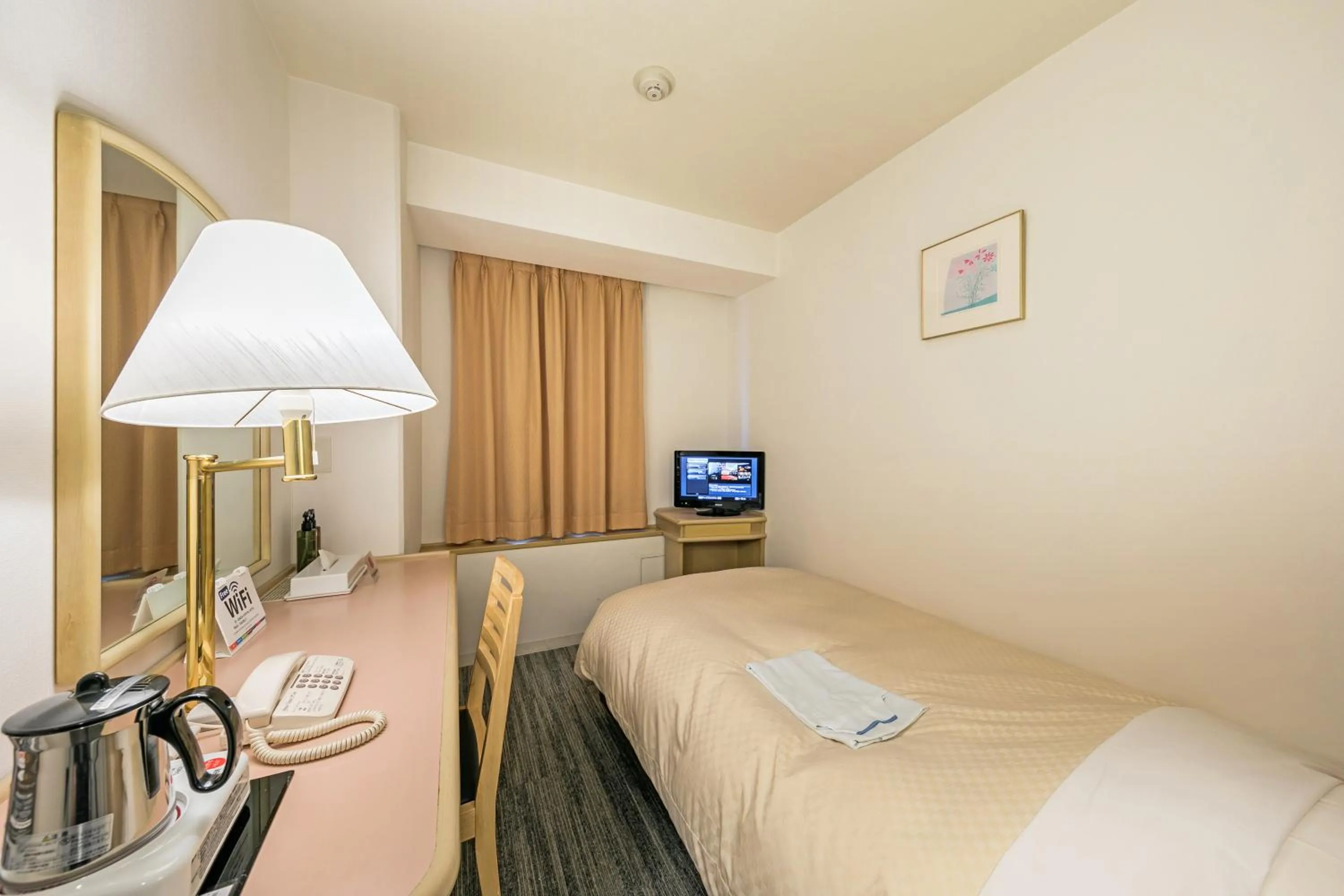 Bed in Ginza Capital Hotel Akane