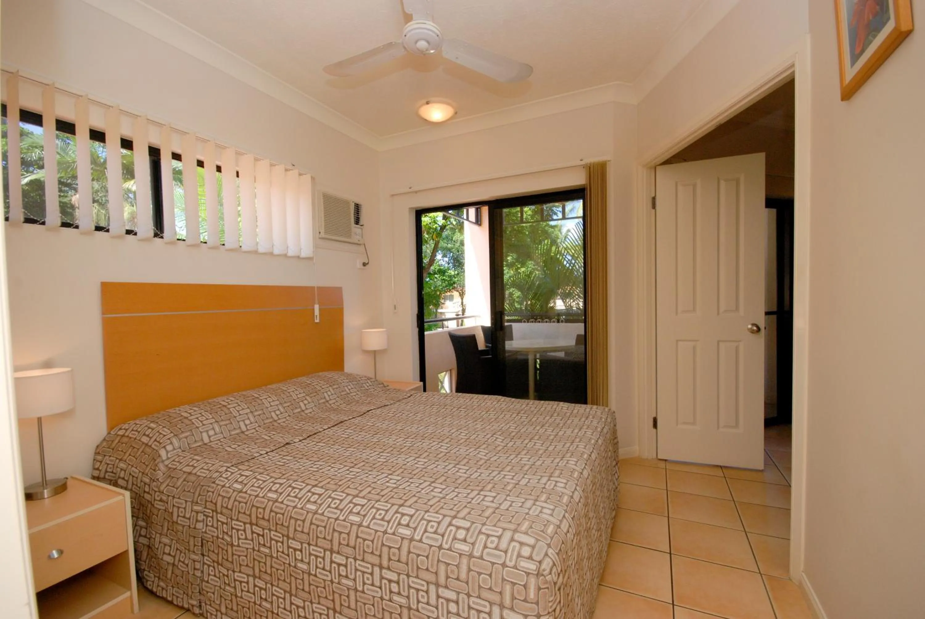 Bed in City Plaza Apartments