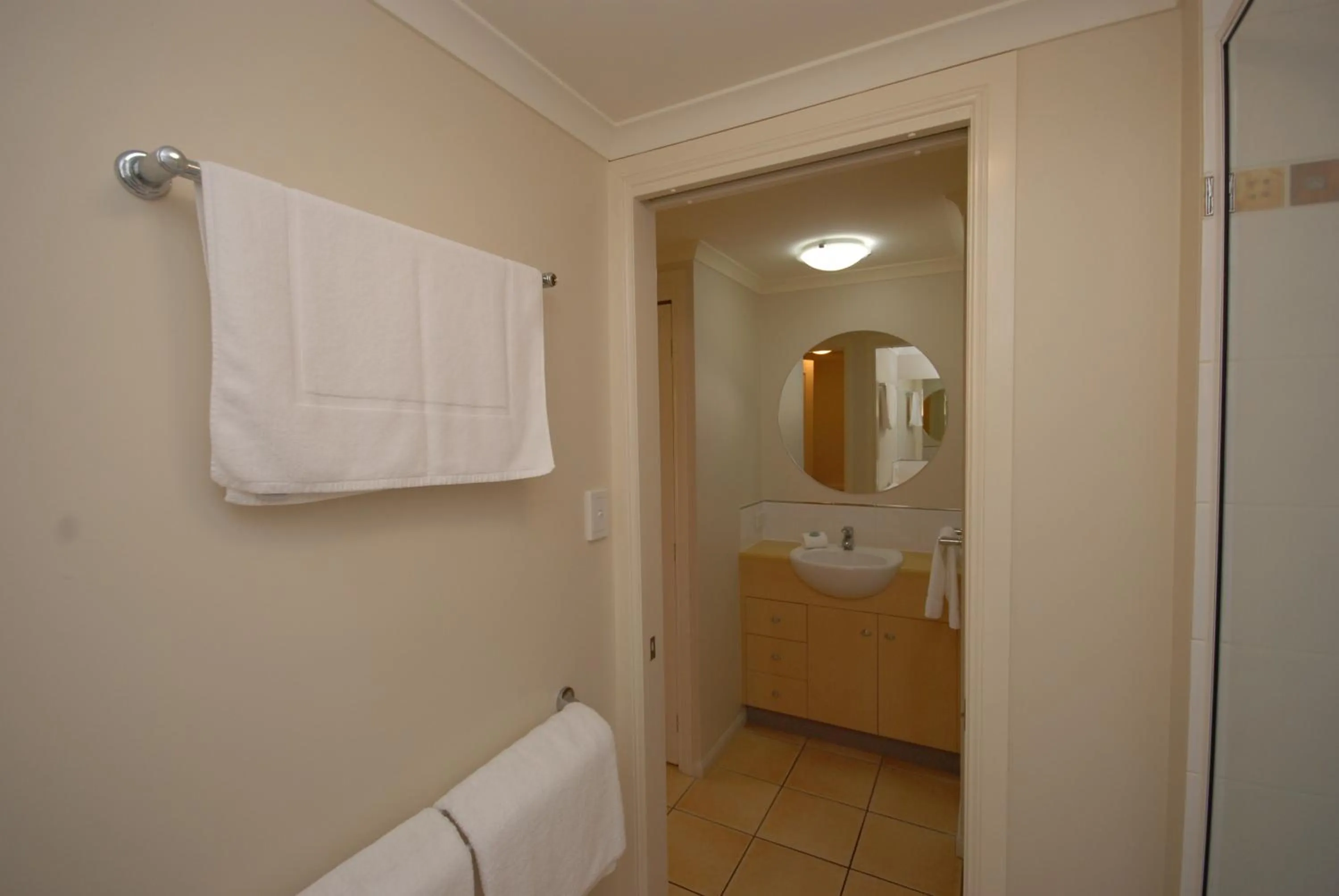 Bathroom, Bed in City Plaza Apartments