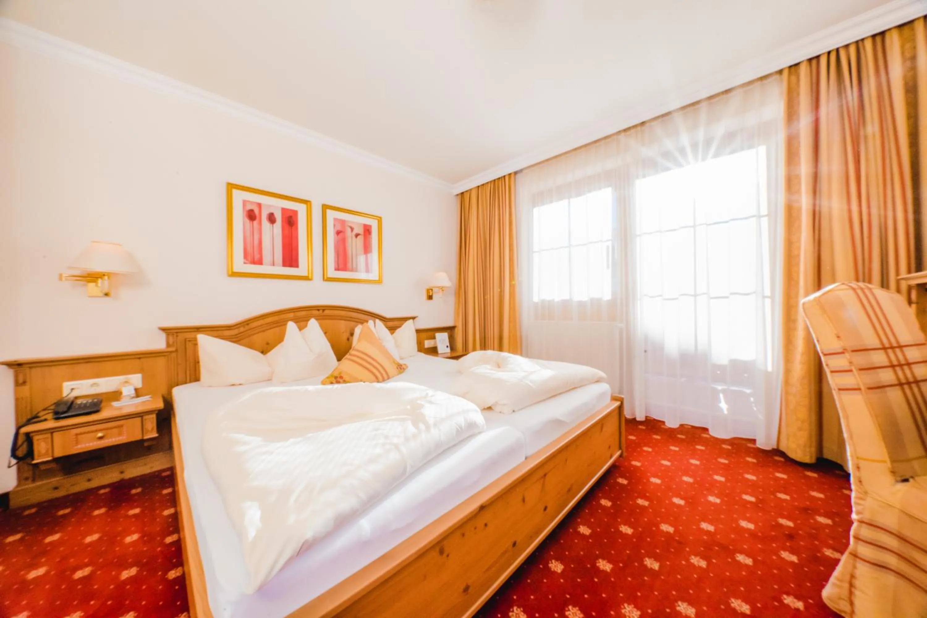 Bed in Hotel Salzburger Hof Zauchensee