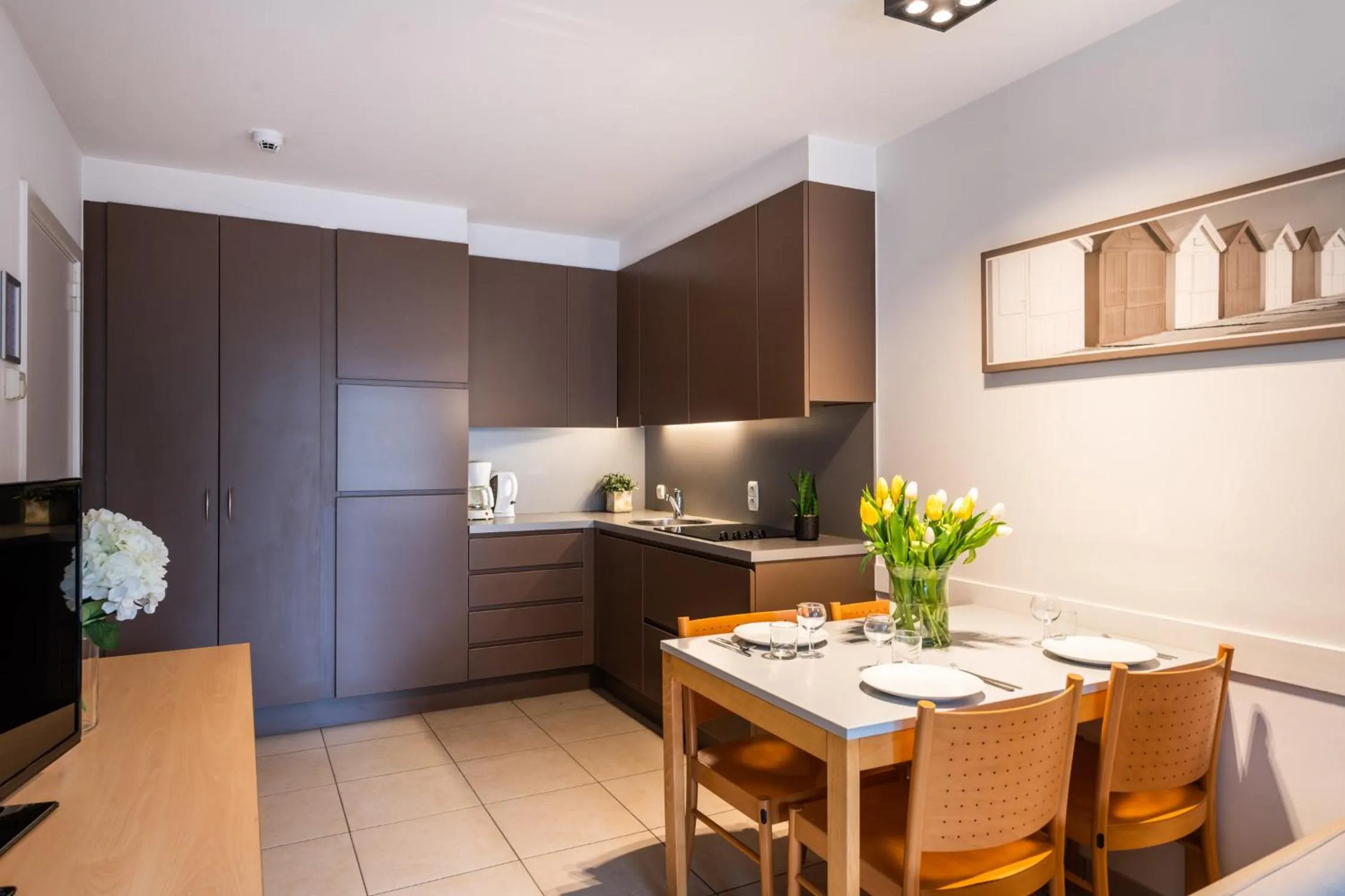 Kitchen or kitchenette in Belcasa Suitehotel