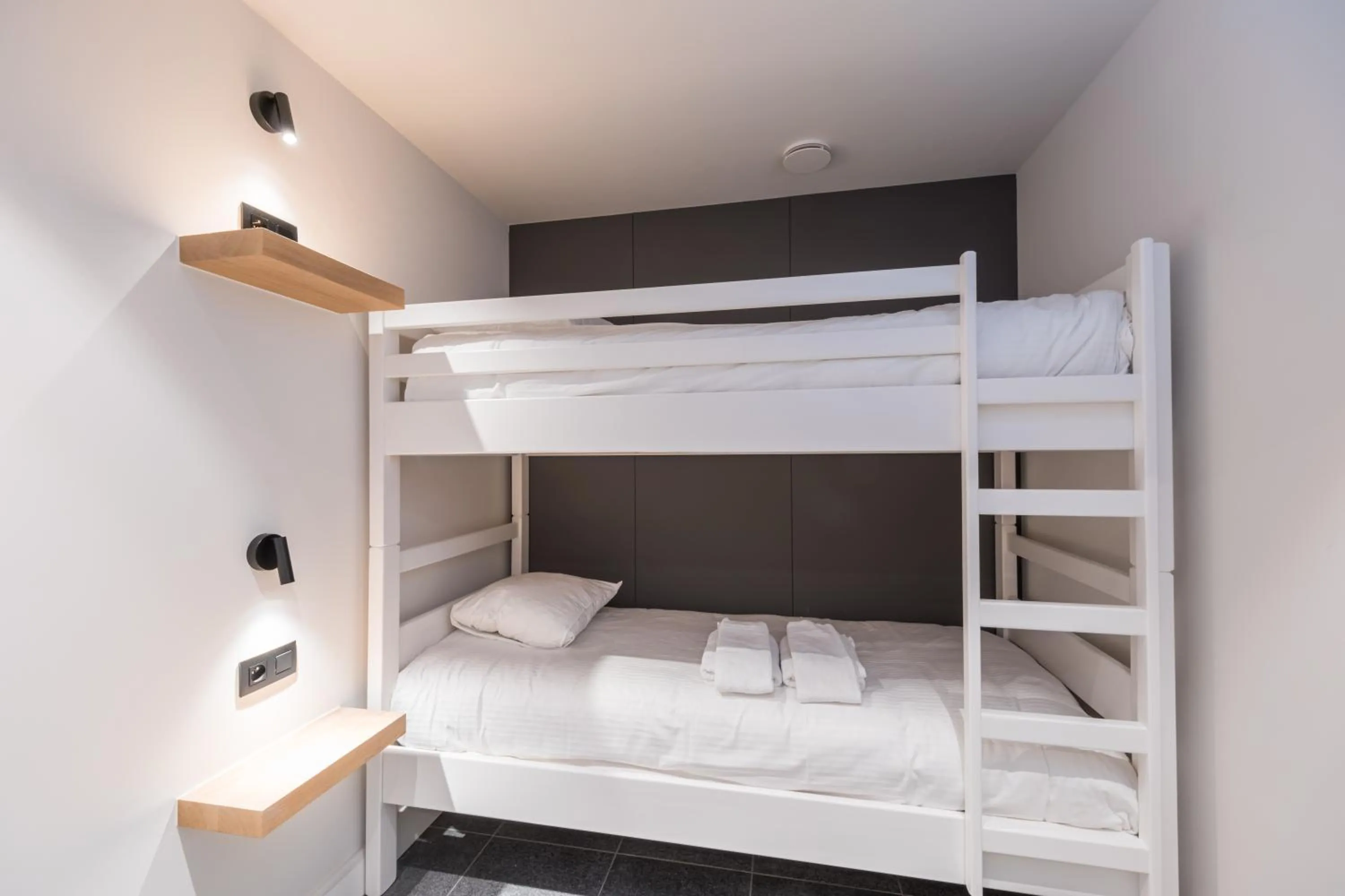 bunk bed, Bed in Belcasa Suitehotel