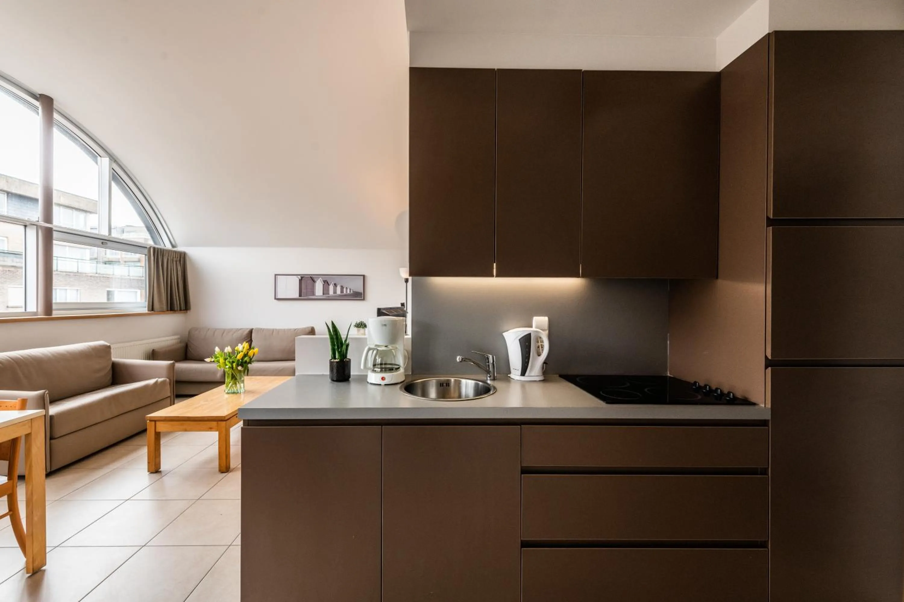 Kitchen or kitchenette in Belcasa Suitehotel