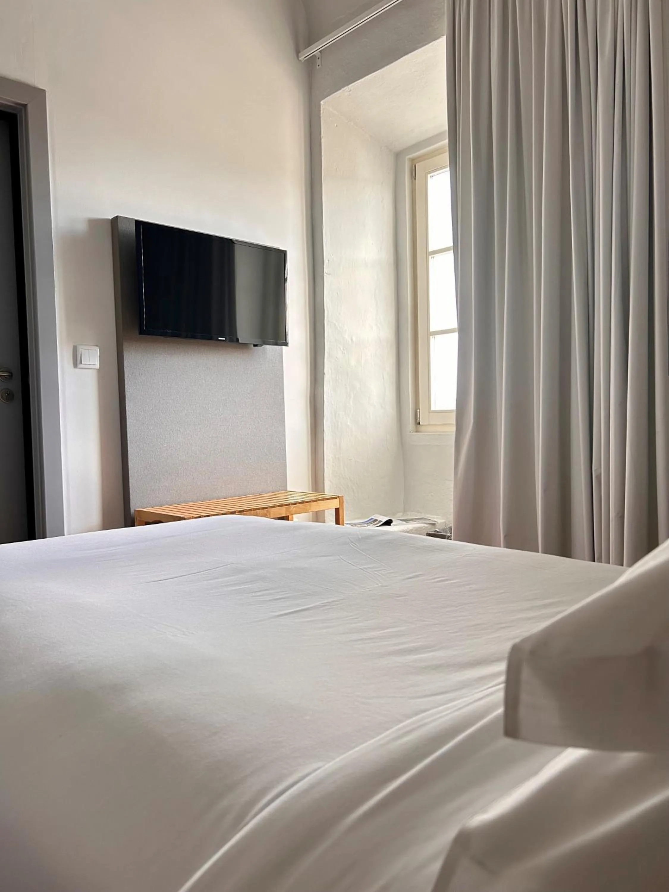 Photo of the whole room, Bed in The Noble House - by Unlock Hotels