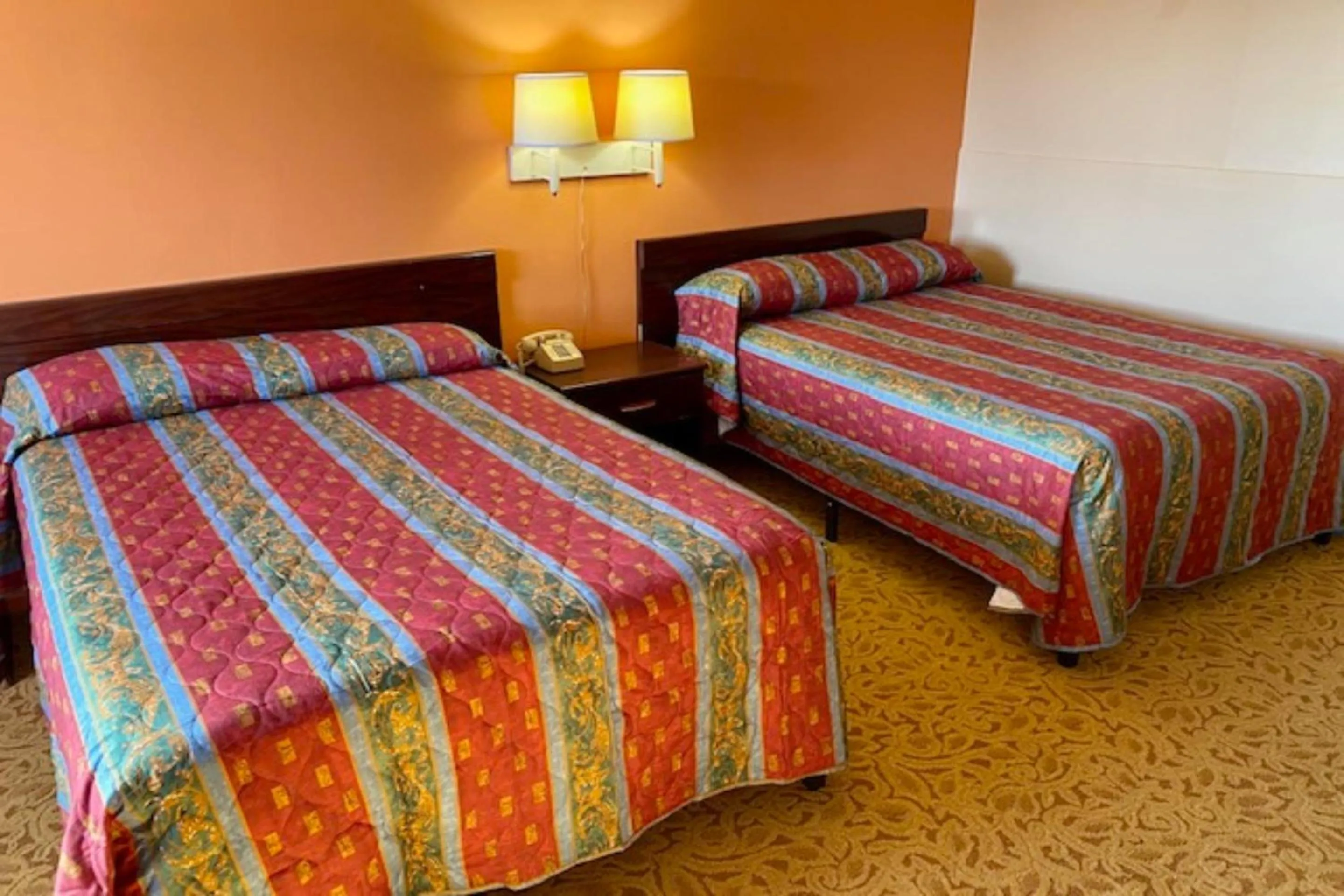 Bedroom, Bed in Red Carpet Inn & Suites Lima -Listing Partner