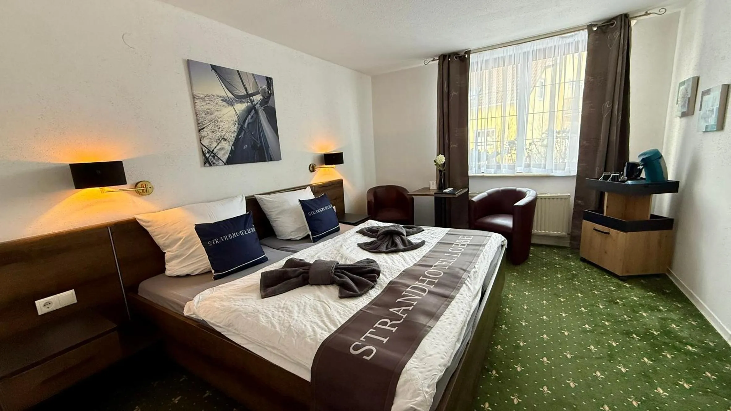 Bed in Strand-Hotel Lobbe