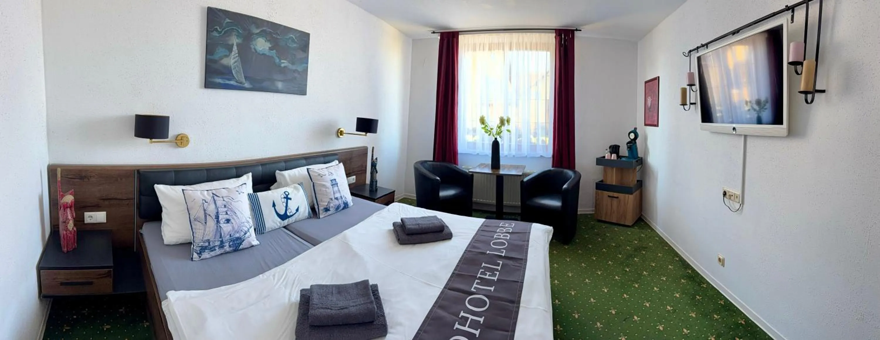 Photo of the whole room, Bed in Strand-Hotel Lobbe