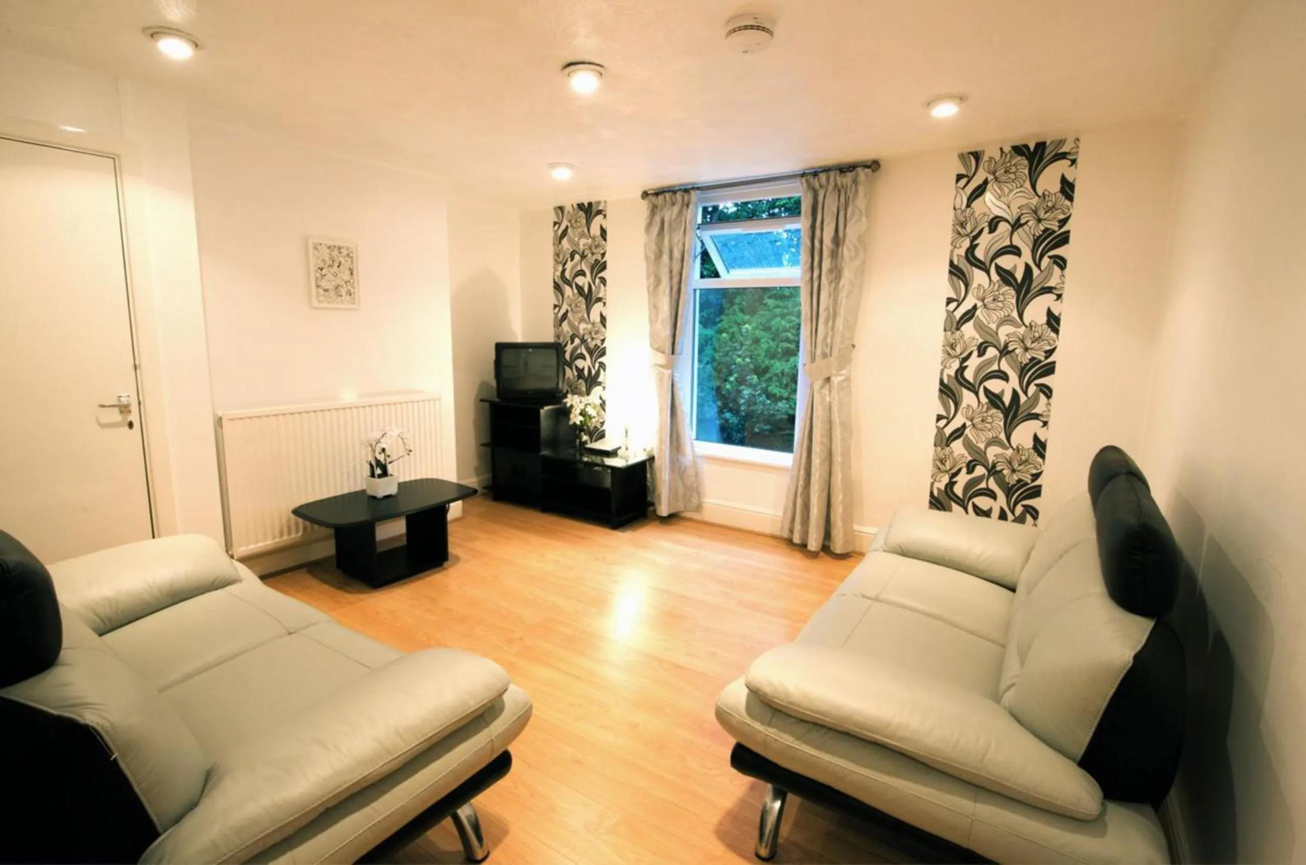Living room in La Suisse Serviced Apartments