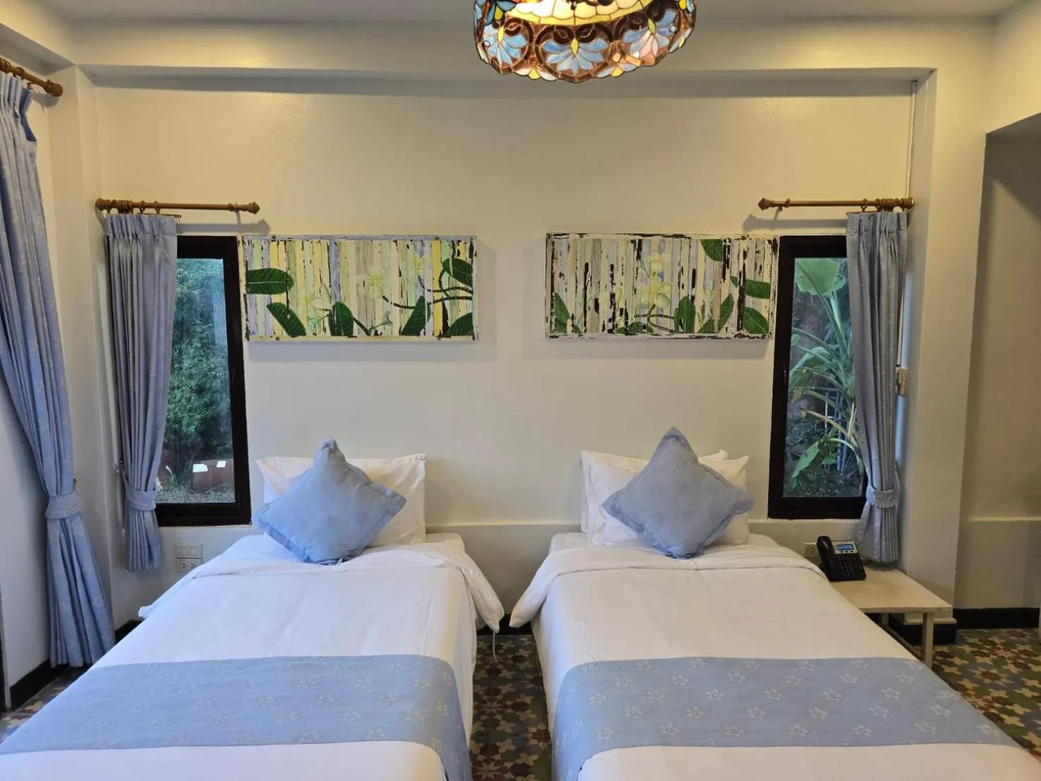 Bed in Pludhaya Resort & Spa