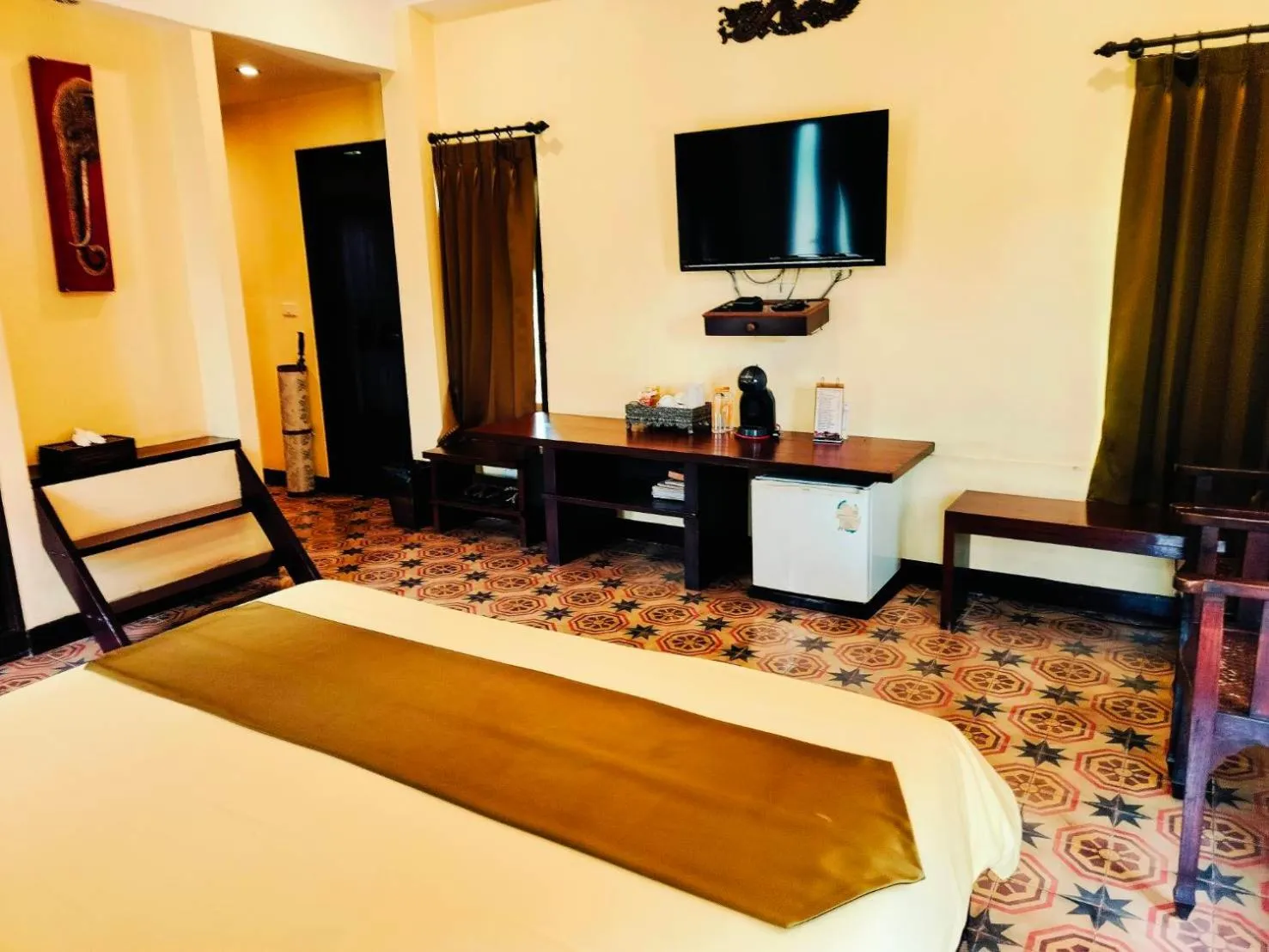 Bed in Pludhaya Resort & Spa