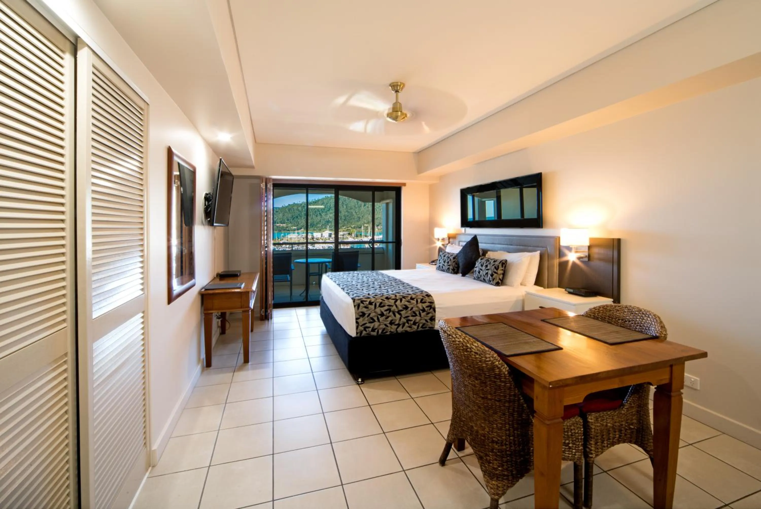 Bed in Portside Whitsunday Luxury Holiday Apartments