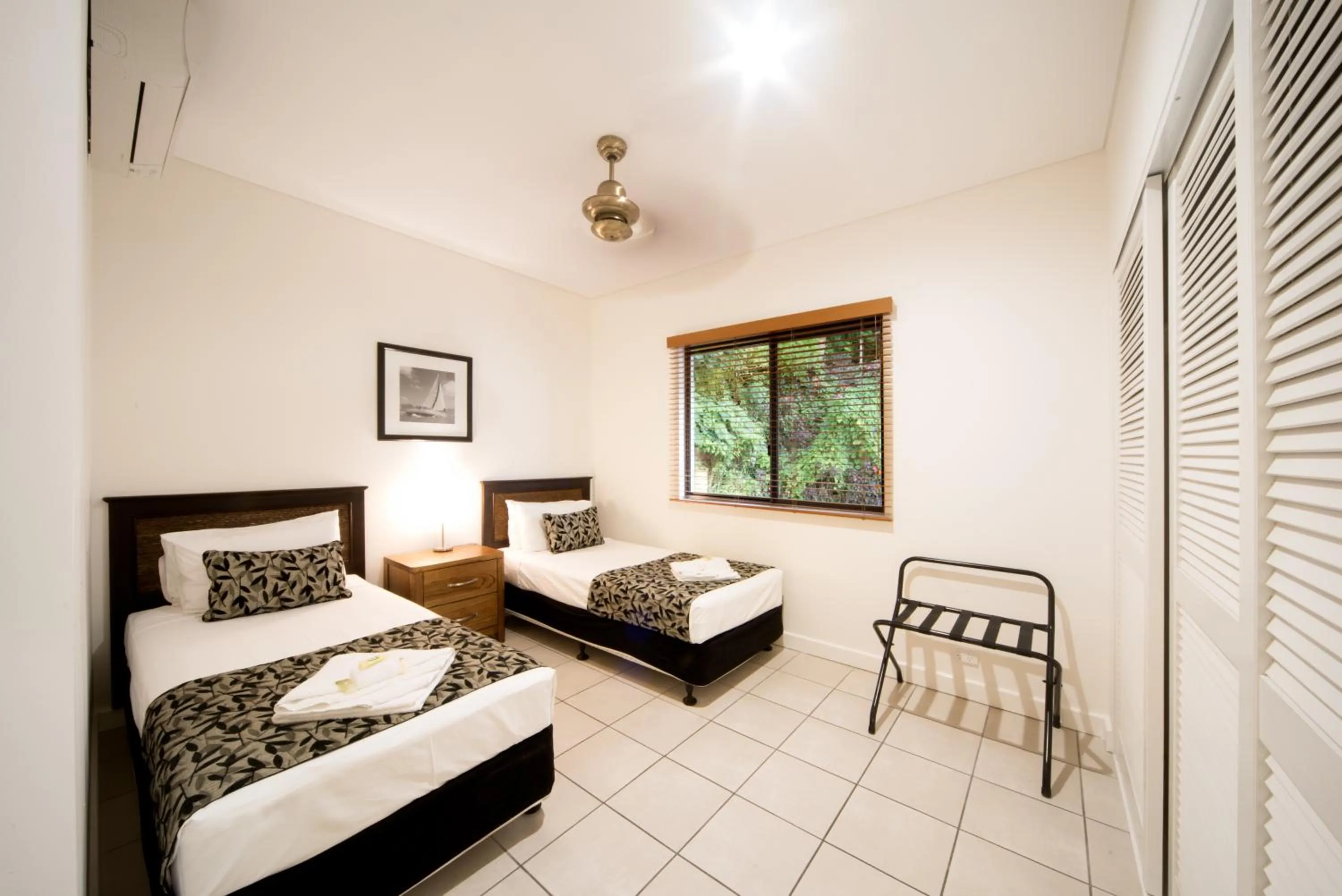 Bed in Portside Whitsunday Luxury Holiday Apartments